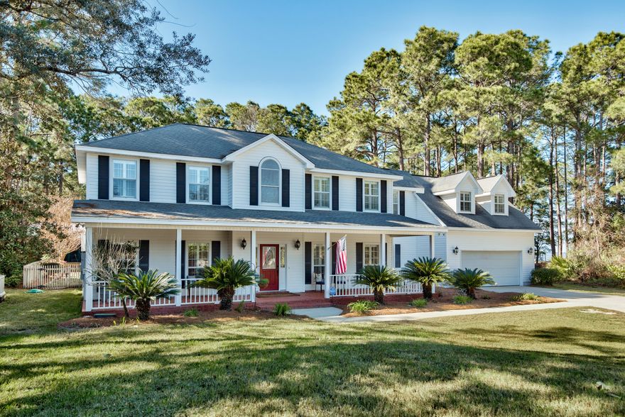 New Price! Private and peaceful...Canal-front property on Hewett Bayou. Meticulously maintained Colonial featuring 4 BR; 3 Full Baths; HW Floors; Gourmet Kitchen appliances including Dacor gas Cooktop; Double oven & Built-in Wine Fridge. Tons of counter space, cabinetry and a tile back splash. Main Living area is perfect for entertaining w/built-in wet bar and access to the Perfect outdoor living space featuring covered lanai with pool & outdoor kitchen. Walk out to the back yard green space and the canal where you can dock a boat, store your paddle boards, kayak, etc. Relax under the covered deck in the hot tub on those cool days/nights.