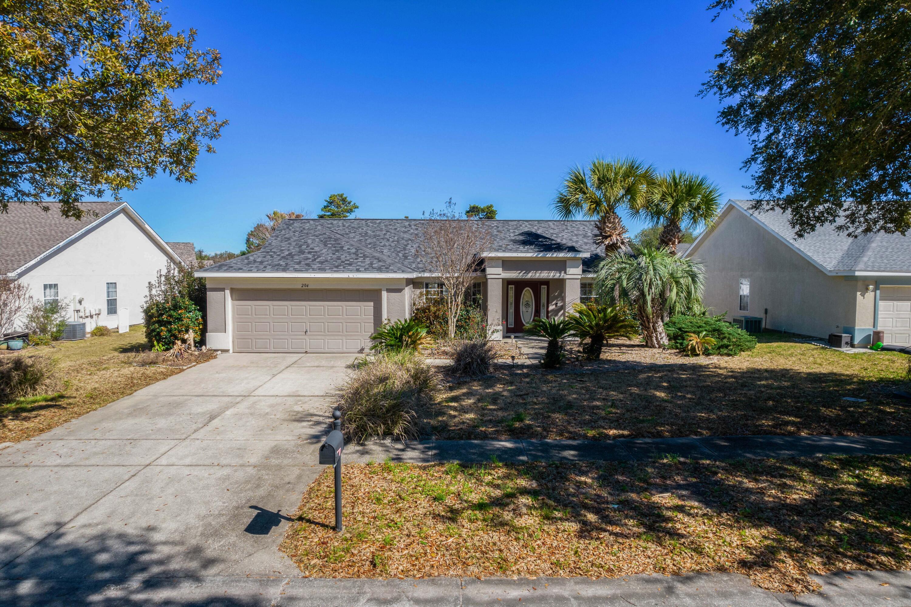 Welcome to Palmetto Trace! The perfect neighborhood to live in if you like being within a short walking distance to shopping, dining, entertainment and the beach! This beautiful home is located far enough away from the entrance to escape the noise from the Parkway and just a short walk to the community pool. It boasts a large lot of 0.23 acres with a fully fenced in backyard, huge sunroom with a hookup for a hot tub, new paint on the inside with granite counters and stainless appliances in the kitchen, a newer tile, zero entry shower with a built in seating area, double vanity, water closet and huge walk in closet with built in shelving in the Master En Suite and two nice sized guest bedrooms in a split floor plan layout. Verify measurements if important.
