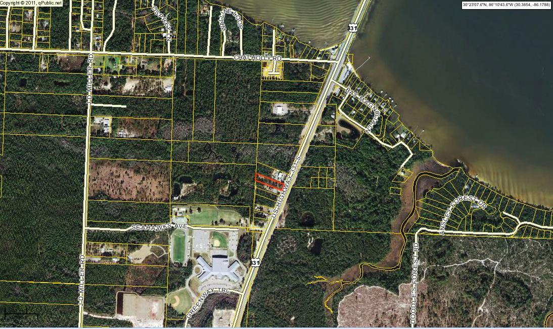 Zoning for this lot is Village Mixed Use. This property is 1 acre and has 100 foot of road frontage on US 331.I have included in the ''Documents'' a copy of the ''Future Land Use Element Policies'' for development of the Village Mixed Use category for US Hwy. 331 south of the Clyde B. Wells Bridge.