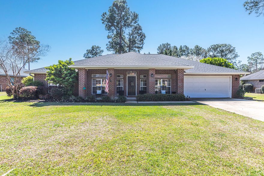 VA-qualified buyer may assume the Seller's 2.5% VA loan. Welcome to this stunning REMODELED 4 bedroom, 2.5 bath home nestled in the sought-after community of Holley By The Sea! Beautiful curb appeal highlighted by a charming front porch. Open floor plan complete with wood-look tile flooring throughout the main areas of the home. The living room boasts raised ceilings, built-in shelving, updated lighting, and a cozy fireplace. The kitchen has been completely REMODELED and features white shaker-style cabinetry, stainless steel appliance package with a gas range, quartz countertops, and tile backsplash. With an island and breakfast nook, this kitchen is as functional as it is beautiful. Separate dining room for more formal occasions. The spacious primary bedroom offers access...(see more)