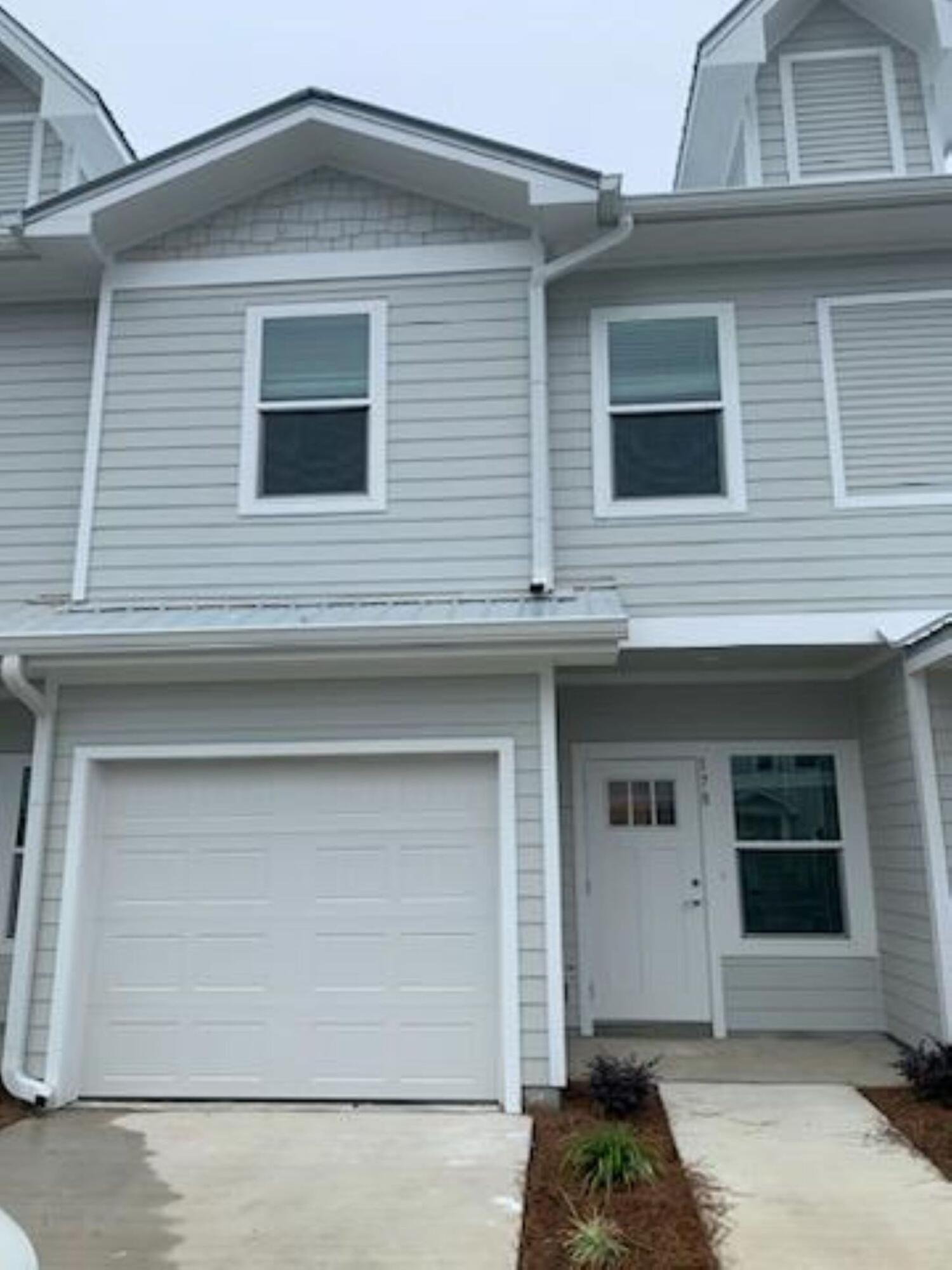 NEW CONSTRUCTION! AVAILABLE IMMEDIATELY! Conveniently located just 20 minutes from the white sand beaches of 30A! Schools, church and storage are close by. Easy commute to Destin, Niceville and Santa Rosa Beach! Complex offers great amenities such as a pool and pool house! Enjoy quiet evenings on your covered patio. This BRAND NEW unit features quartz counter tops, stainless appliances, plenty of storage, large bedrooms, a spacious floor plan, LVP flooring in the common areas and a GARAGE! Washer/dryer hookup located on 2nd floor. Unit comes with two assigned parking spots.Unit is non smoking. PET FRIENDLY. Assigned parking spaces are located in front of the unit. Trash and lawn care Included. No lease fees. FREE 24/7 Emergency maintenance. Professionally managed by local Owner.