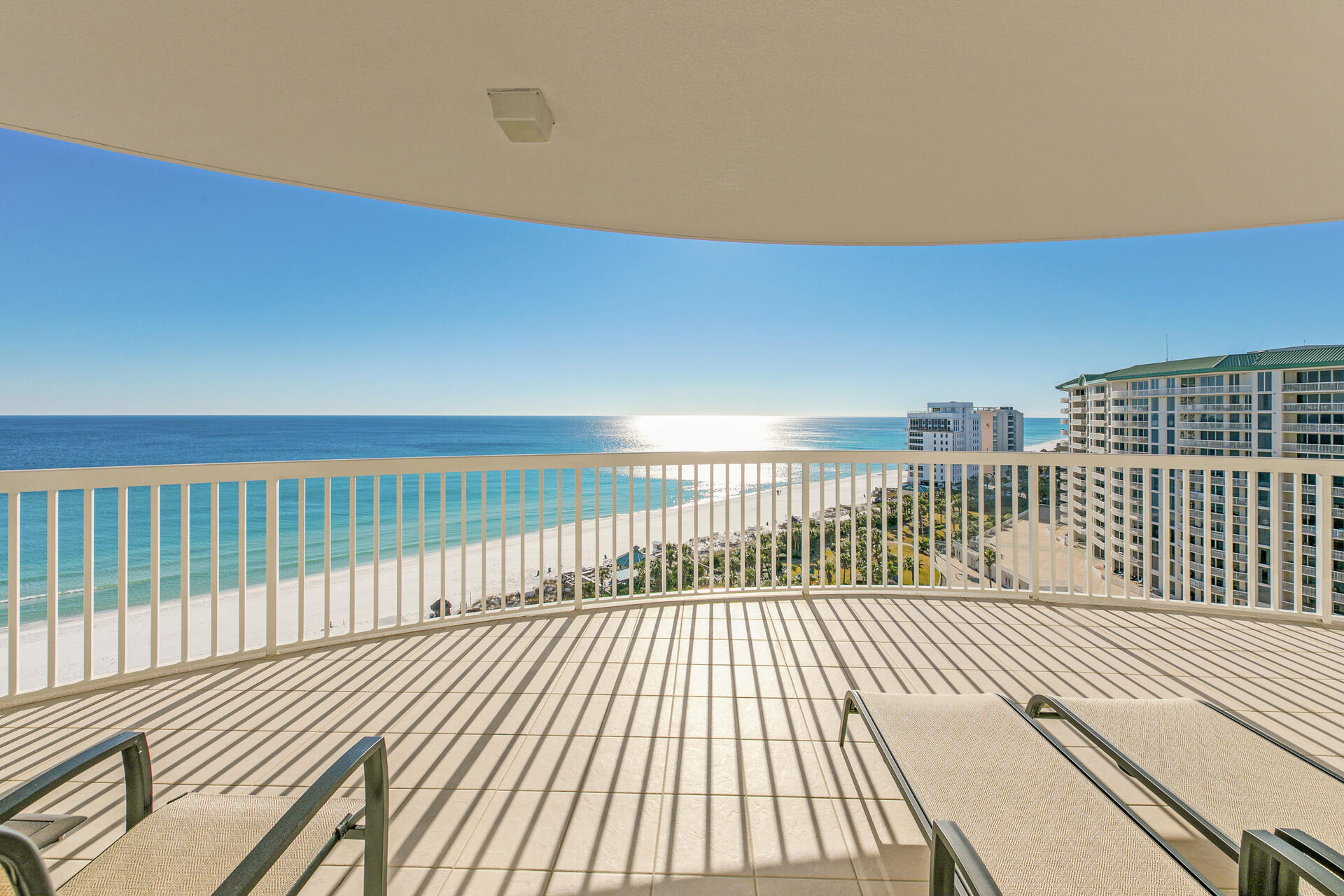 Beautiful gulf front 3 bedroom, 3 bath condo on the 12th floor of exclusive, non rental unit at St. Thomas in Silver Shells. Amazing panoramic views! All 3 bedrooms, face the Gulf which makes this unit unique, along with your semi private elevator which opens directly into the condo foyer. There's beautiful cypress wood flooring in the living/dining area, upgraded kitchen with marble and stainless steel appliances, built in wine cooler in the wet bar area and custom window treatments throughout. Master bath has double vanities, Jacuzzi tub and separate walk-in shower. As a full time residence or second home, beachfront living doesn't get any better. St. Thomas has an elegant lobby, library, private beach side pool and hot tub, deeded garage space.