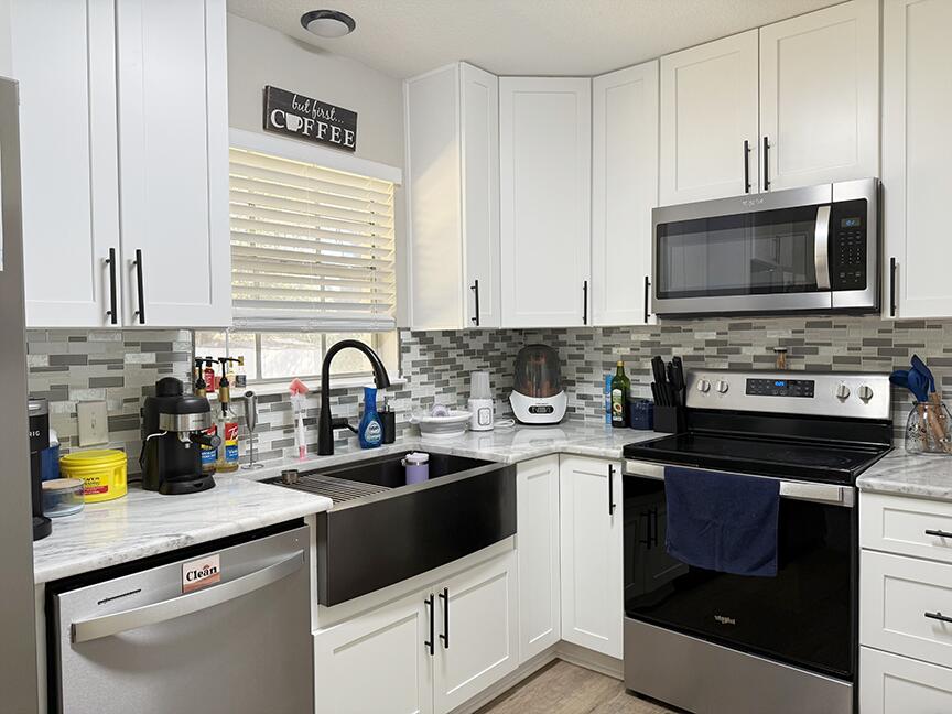 Welcome to 2937 Sholtz Avenue. Step inside to discover a wholly updated interior featuring new kitchen cabinets, granite countertops, and stainless steel appliances, creating a culinary haven for any home chef. The living area boasts fresh paint and laminate flooring, providing a warm and inviting atmosphere. There is even a separate den! Both bathrooms have been tastefully remodeled with modern fixtures and finishes. The generous bedrooms offer ample closet space and natural light, making each room a cozy retreat. The yard is a generous .35 acre, fenced for privacy. New Roof in 2023. Outside, the expansive fenced backyard provides a private oasis, perfect for outdoor gatherings, gardening, or simply unwinding under the Florida sun. The property's prime location offers easy access to local schools, shopping centers, and dining options, making daily errands a breeze.
With its comprehensive renovations and desirable features, 2937 Sholtz Avenue is move-in ready and waiting to welcome you home. Don't miss the opportunity to own this stunning property in a friendly and convenient neighborhood.