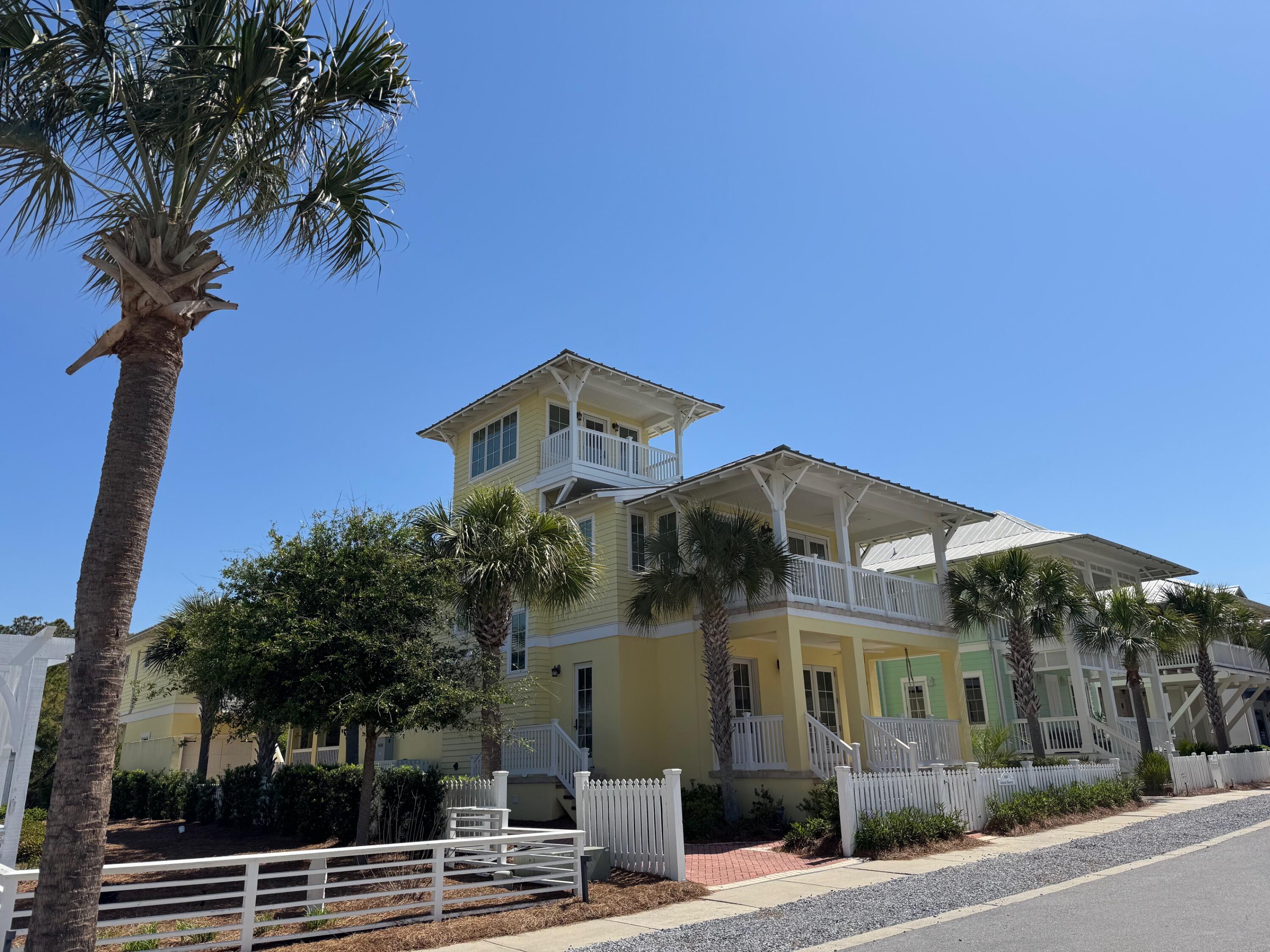 This amazing 5 bedroom, 3.5 bath house with a one car garage, carriage house and inground pool in Carillon Beach will not disappoint! With slight but impactful gulf and lake views from the second floor and from the tower, this house has it all! Built with concrete construction on the first floor, this sturdy home also has all of the most up-to-date conveniences, like an automatic Generac generator and an electric car charger. The home has also been meticulously maintained throughout the years by the one and only owner. This well cared for second residence has had many updates and a full list can be seen in the Documents section. You will enjoy a bedroom with ensuite on the first floor, which could be a master, along with a laundry room, powder room and an enormous kitchen, dining and living room area. From the living area, you will be welcomed by a spacious screened in back porch, which then leads to the beautiful inground pool! All of these areas are perfect for entertaining! From the back, you can see the one car garage and the carriage house, which consists of a living area, full bath and an extra space that could be used as a bedroom or a workout area, as the current owners have. Continuing on through the rest of the house, the second floor boasts a master with an ensuite bath, an extra room with a sitting area and a balcony, where you can enjoy the community and the serene gulf or lake views. There is a guest room and two other bedrooms, one with bunks beds and the other with a daybed. The guest bedroom on this floor is a very large room with a Jack N Jill bathroom, that is also shared with the other bedrooms. To conclude the main house, there is a third-floor tower that you can lounge in and relax on the balcony as well. This house truly is a gem and has so much to offer. Even though it has not been a vacation rental, with its location, massive footprint, and all of the fabulous entertaining areas, it would make a fantastic rental! Carillon Beach is a gated community with top notch amenities and nearly a mile of white sandy beach. It truly is paradise! A list of Home Automation Systems and the Exclusions List can be found in the Documents Section.
