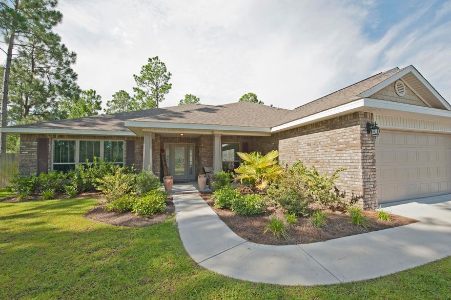 This is the Monterey Bay V model from Whitworth builders that you've wanted with all the upgrades that weren't available from the builder...such as wood flooring throughout the living areas right on into the Master bedroom and a custom bar with wine cooler built right into the dining room nook! The master bath has all the upgrades, including full tiled walk in shower, jet tub and two large walk in closets. Upgrades in the kitchen include beautiful breakfast bar, full center island and double oven. This home truly has it all for you...large comfortable office, spacious covered back patio overlooking the fully fenced yard with a great fire pit and don't forget the oversize three car garage.