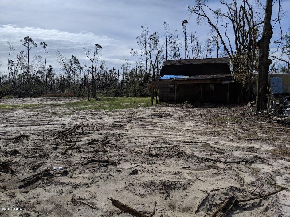 This is two lots for one price. Lot has City water and City Sewer, and electricity.Barn is still standing but house has been demolished. Can build house or pull a mobile home in. Zoned for Mobile Home. Must see this Huge lot on dead end street today!