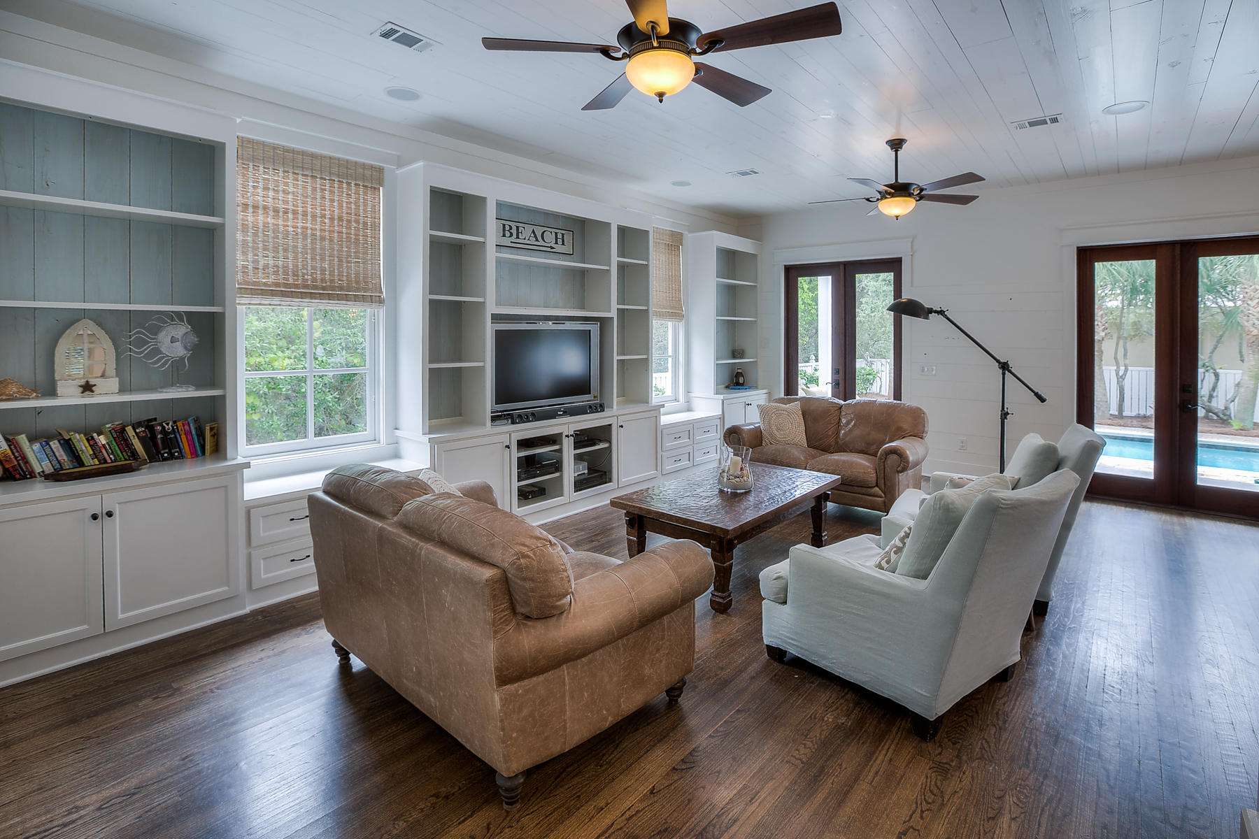 Charming beach house, located in a quaint 7 lot subdivision! This home offers parking for approximately 6 cars,a private neighborhood path to beach access, landscape lighting, a private heated pool with a large pool deck, 2 large porches and a 3rd level balcony that overlooks the Gulf of Mexico. The home has a master bedroom on both the first and second level and two queen size bunk rooms. Each bunk room has its own private bath, each with a double vanity. There are 3 living areas, one on each floor! The living area on the 3rd level is complete with a queen futon and a wet bar! This home was recently renovated. These renovations include wood planking on some walls and ceilings, new window treatments, hardwood floors throughout, new 16 SEER HVAC systems, foam insulation