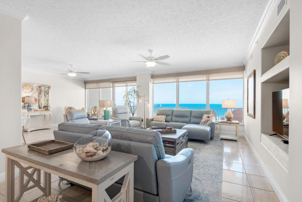 Gorgeous! Over 2300 square feet with amazing views AND A DEEDED PARKING SPOT IN THE GARAGE! Hidden Dunes condominiums boast the best layout on the beach, and this one has fabulous updates. New countertops, new appliances, new furniture, new window treatments, new light fixtures, newly painted, new barn door in main bath and more. The Hidden Dunes condo layout is spacious and feels like a home, making it perfect for full time residence, family beach home, or rental investment. Enjoy 3 bedrooms, each with private bath, GULF FRONT master, full size laundry room, huge balcony, and great storage and additional closet outside too. Hidden Dunes is a gated community with amenities that include a gulf front pool, kiddie pool, fitness room and community room and more!