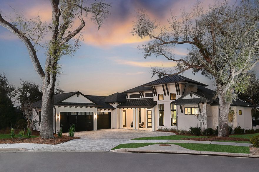 MOVE-IN READY | NO LEASE-BACK | WATERFRONT MODEL HOME WITH DESIGNER FURNISHINGS The showpiece model everyone remembers is now available for immediate occupancy--no lease-back required. Previously offered with an 18-month delay, this fully furnished Arthur Rutenberg home is ready for its first full-time owner. Positioned on 154 feet of deep-water bayou frontage, this custom-built residence blends timeless elegance with modern functionality in the waterfront community of Cove Pointe. With over 5,000 square feet under roof, the 4-bedroom plus den plus bonus room layout showcases soaring vaulted ceilings with exposed beams, disappearing glass walls, and curated designer finishes throughout. The heart of the home opens to a resort-style outdoor living space featuring a vanishing-edge pool, spa, lanai, cabana, and a fully equipped outdoor kitchen. Additional highlights include a gourmet kitchen with hidden pantry, smart home features, a 3-car garage, and a private Home Delivery Center for secure, contact-free package drop-off. Located in a tranquil bayou setting with direct access to Shell Island and the Gulf, and situated in a low-dues HOA community, this is a rare opportunity to own a turnkey luxury waterfront property without the wait. All information deemed reliable but not guaranteedif important, buyer to verify.
