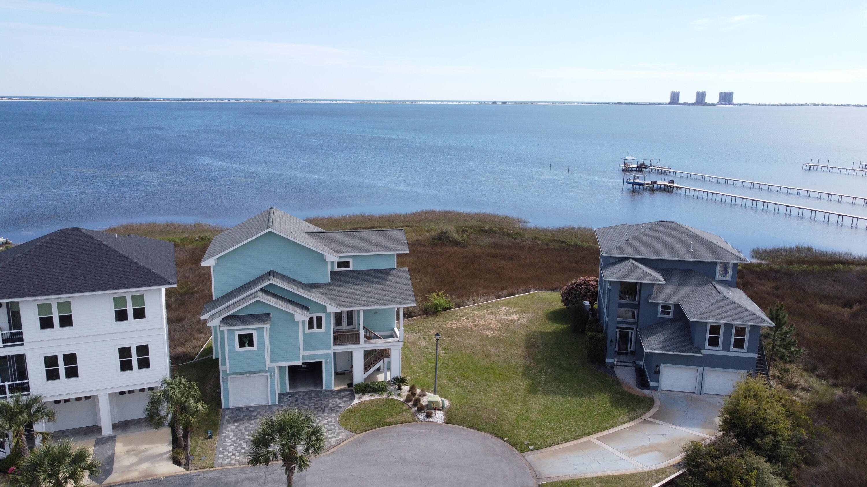 Welcome to the waterfront community of Sawgrass at Tiger Point! This beautiful lot is the perfect opportunity to surround yourself with the best this area can offer. This cleared lot will give you access to stunning views with a community dock and a swimming pool. Just next door, the golf club just opened a brand-new club house and restaurant. This gorgeous lot faces the sound and is ready to build with a full set of house plans included! Once you build your forever home here, you can relax knowing that the HOA will do all yard maintenance for you! This location is also close to shopping, dining, and access to the Emerald Coast's amazing white sand beaches! You have to see it to believe it! Schedule a showing today!