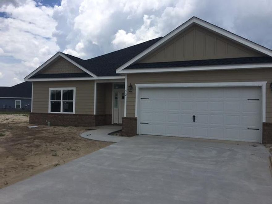 Cross Creek Charmer ''The Brighton'' plan utilizes great looking details & maintains an open feeling. The entry gives a classy first impression with lots of natural light & a coat closet. Seamless flow through galley style kitchen. Family room has exaggerated trey ceiling & double crown molding. Exterior door provides access to outdoor living on the covered rear porch. Large Master BR will be your favorite retreat with crown molding. Home Features include granite topped countertops, tile flooring, Walk in shower & his/her closets. Ceiling fans in all bedrooms. SS appliances. This Craftsman style is reflected with Hardie fiber cement siding combined with brick water table. The yard is landscaped with sod & irrigation system, plus a one yr. Sentricon termite b