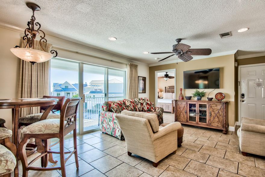 AGENTS READ PRIVATE REMARKS PRIOR TO CALLING LIST AGENT FOR SHOWING! One of the nicest units in Beachside Villas! This 3 bed 2 bath completely remodeled END UNIT sits on the TOP FLOOR & faces South for some lovely Gulf views, sunsets & great light throughout the day. It has luxury homes for neighbors & looks over the back lawn instead of parking lot or other buildings.It's currently on rental program & did 30k in 2020 income & that was w/ 6 weeks of prime Spring Break rental period being shut down due to covid. Stainless applcs, brand new stove, granite, Corian, lovely hi end cabinets, plantation shutters, crown molding, rich Tommy Bahama style furnishings. Sold turnkey. Will be a great investment or residence for someone wanting to be right next to one of our best beaches!