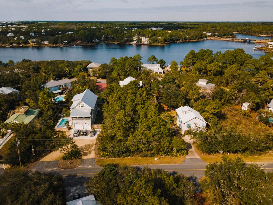 Beautiful quarter acre+, wooded lot, tucked away in Eastern Lake Estates. This rare homesite is a SHORT walking distance to the Gulf of Mexico and to Eastern Lake. No build-out times, No HOA fee's & a rental friendly neighborhood! Kayak/Canoe from the Lake to the Gulf of Mexico from the Lakewood's Public Boat launch, 200 ft away. Possible Lake views from the 2nd or 3rd floor. Room for a carriage house. Low density, quiet & an ideal location- don't miss this opportunity to build new construction right here in Seagrove!***Buyer is responsible for personally verifying details about this property. Any information contained in this listing is believed to be accurate but is not guaranteed. ***