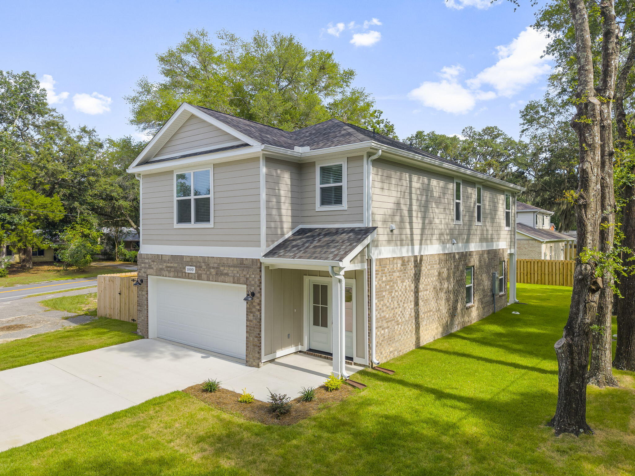 New Construction - 4 Bedrooms - 2.5 Baths - Loft + Walk-In Pantry - Bayou Glimpses -Near the Park! Welcome home to this beautifully crafted new construction home that blends modern comfort with timeless charm. Boasting 4 spacious bedrooms, 2.5 bathrooms, and a thoughtfully designed layout, this home is ideally located just steps from Lions Park, featuring a public boat launch, open green space, and scenic views of Boggy Bayou. At the heart of the home, a bright and open living space flows into a stylish kitchen complete with a large walk-in pantry, perfect for keeping your essentials organized and within easy reach. Upstairs, a versatile loft at the top of the stairs offers flexible space for a home office or sitting area for a quite place to read. Step outside and relax on the porch. Both front and back porch feature beautiful tongue and groove ceilings that add a warm, custom touch and elevate your outdoor living experience. You'll also enjoy sneak peek views of Boggy Bayou, offering a peaceful coastal backdrop. With its prime location, stylish finishes, and inviting spaces, this home is one you won't want to miss, schedule your private showing today and come see why it feels like home!