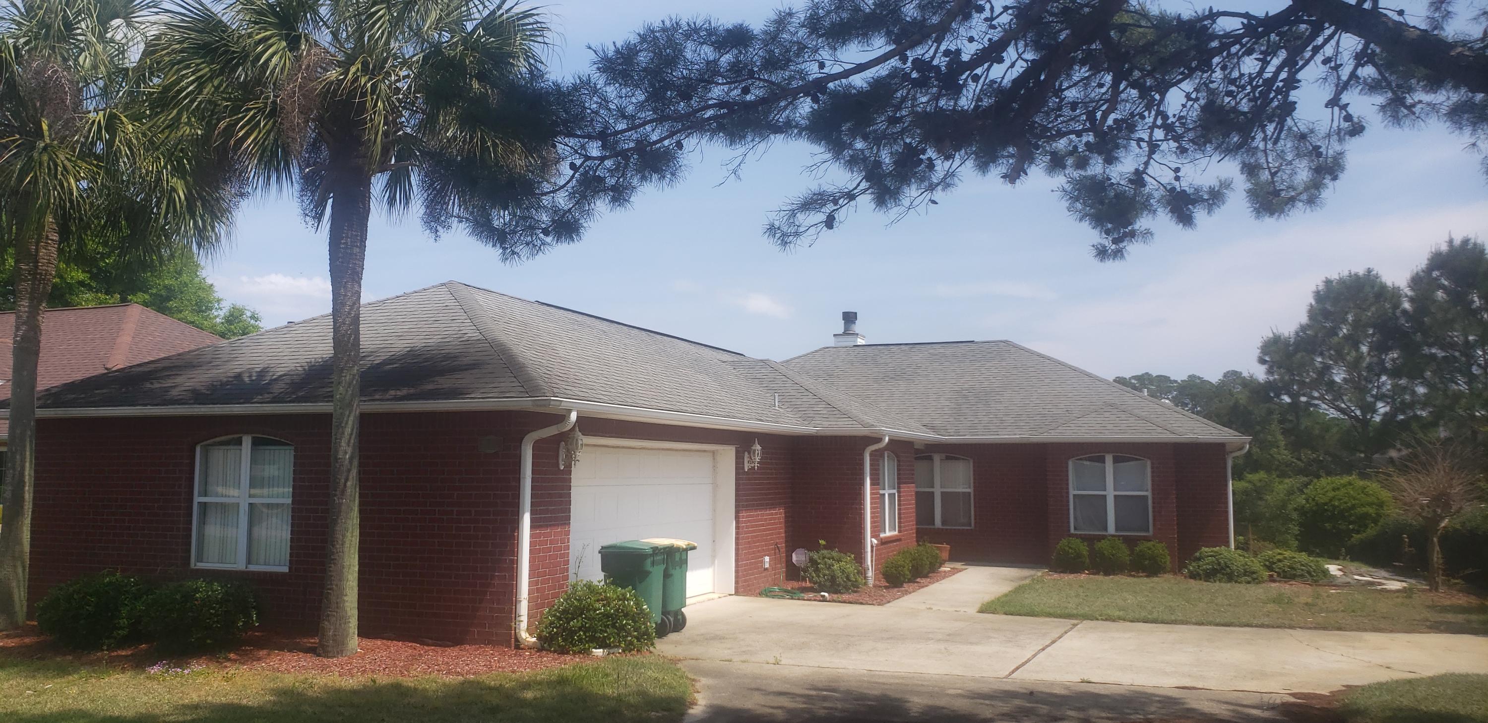 A lovely all brick home in Hidden Creek Golf Course community located adjacent to Holley by the Sea. Enjoy quiet evenings sitting on the enclosed back porch or your morning coffee on the back deck overlooking the pond. The sky lights in the kitchen and bathrooms offer natural lighting.