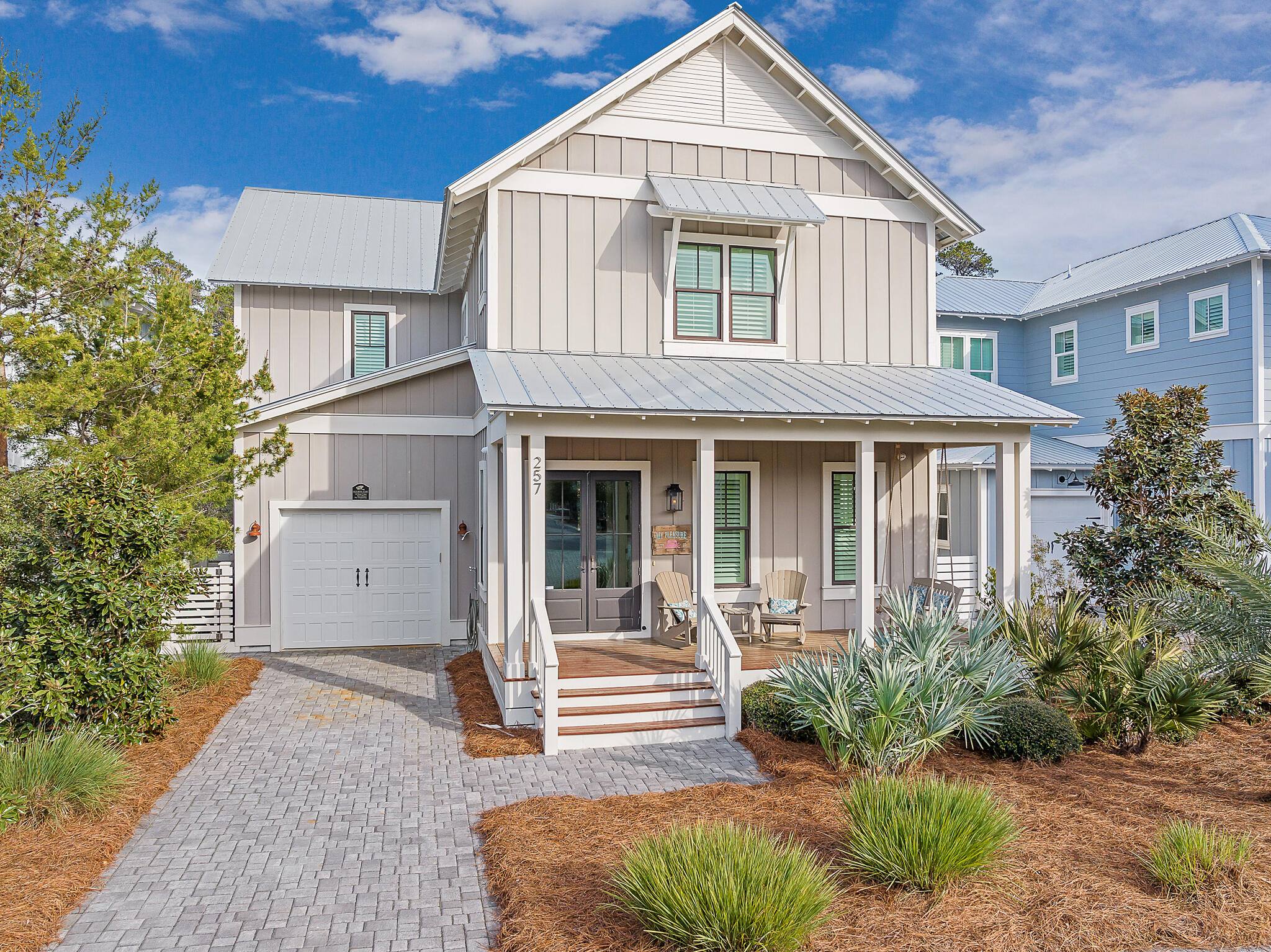 Discover coastal living in the gated community of Lakeside at Blue Mountain Beach. With outdoor living spaces adorned with brick pavers & covered porches backing up to Grayton State Park, this bright & airy residence features 4 ensuite bedrooms plus a double bunk room, providing ample space for relaxation & entertaining. This meticulously maintained home offers the perfect blend of convenience & spacious comfort. Enjoy neighborhood amenities including a pool, playground, & state park trails, while the sandy beaches are just 1/2 a mile away. Additional features include shiplap walls, freshly repaired interior, beautiful wood floors, large closets & custom shutters throughout. Local favorites like Blue Mt Creamery, Red Fish Taco & Justin Gaffery's Art Gallery are all just around the corner.