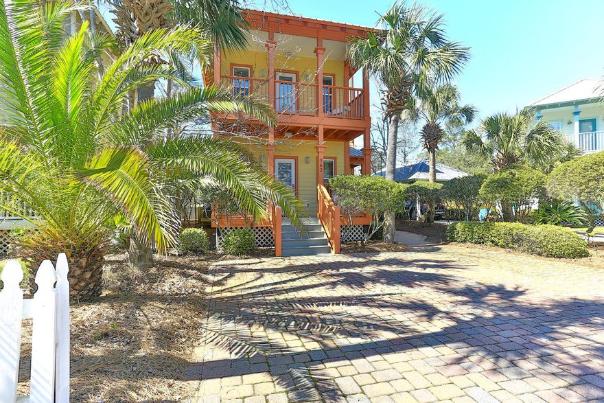 Charming 3 story Cottage in Old Florida Village! Spacious 4 bedrooms and a Tower! Inviting front porches on the main level and off the Master Bedroom. FENCED backyard with your own Tangerine Tree! FURNISHED. Freshly painted interior with 'sunny/happy' colors! Upgraded appliances in the Kitchen with beautiful granite! 3 Full Baths. 3rd Floor Tower with granite wet bar (sink & mini fridge). Oversize tile in the Living,Dining,Kitchen area. Upgraded carpeting in a neutral color in all bedrooms.Shows like brand new! Ready for short term rentals or for your family to enjoy the beach. 3 beach accesses within 1/4 mile; 2 community pools; green space; Come see your new beach home today before it's too late!