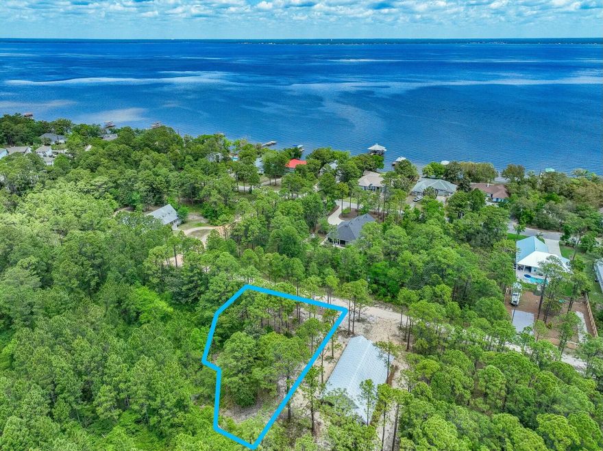 Don't miss this rare chance to build your dream home in the highly sought-after Santa Rosa Beach area! This vacant, build-ready lot offers the perfect setting for your coastal retreat. Nestled in a serene community surrounded by majestic, century-old oak trees, this property combines natural beauty with unbeatable convenience.Enjoy easy access to the nearby boat launch at Kellogg Park, where you can explore both the Choctawhatchee Bay and the stunning white sand beaches of the Gulf Coast. With privacy, prime location, and close proximity to top-tier shopping, dining, and recreation, this homesite checks every box for your beachside getaway.Act fast--opportunities like this don't last long!Buyer to verify all information.
