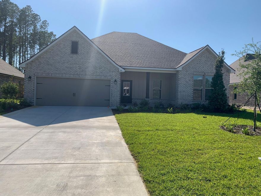 Awesome Builder Rate Incentives!  (Restrictions apply) The COMSTOCK III G in Starburst at Hammock Bay community offers a 4 bedroom, 2 full bathroom, open design. Upgrades added (list attached).  Features: double vanity, garden tub, separate custom tiled shower with frameless door, and walk-in closet in the master suite, double vanity in 2nd bath, walk-in closet in bedrooms 2 and 3, covered front porch and rear patio, kitchen island, walk-in pantry, recessed lighting, crown molding, undermount sinks, framed mirrors, smart connect WIFI thermostat, smoke/carbon monoxide detectors, landscaping package, architectural 30-year shingles, flood lights, and more!Energy Efficient Features: water heater, kitchen appliance package, vinyl low E windows, and more!