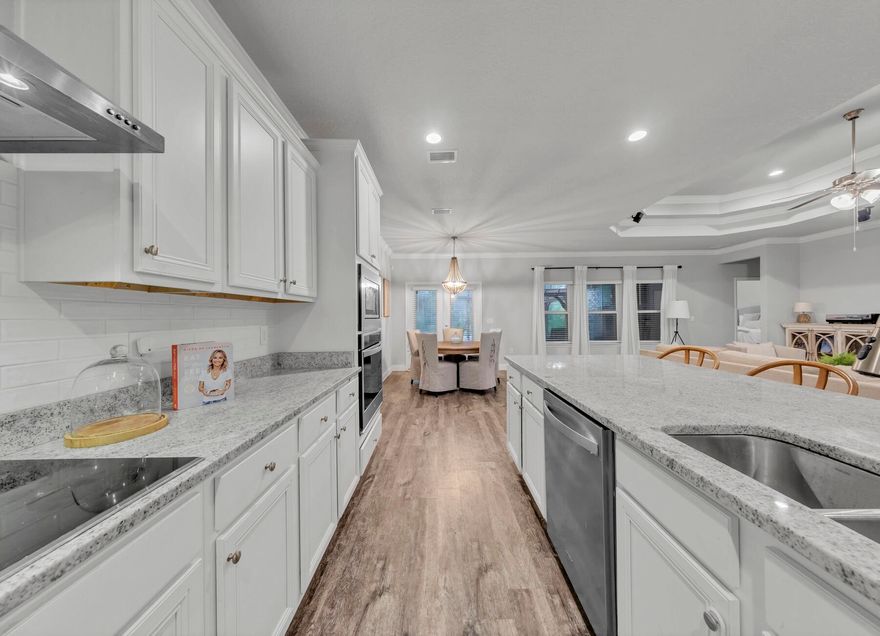 Welcome home to Paradise! This beautiful and spacious single-level smart home in the popular Peach Creek subdivision is minutes from 30A beaches, schools, shopping, restaurants, and iconic Seaside! 2020 construction! Food trucks often frequent this friendly neighborhood and a new walking path makes outdoor activities easy. This sought after ''McKenzie'' model is 3,117 square feet and features 5 large bedrooms, a huge study and formal dining room- more space than you will ever need! Sellers have added tons of upgrades, including a screened-in back porch, privacy fence, outdoor kitchen area, patio, kitchen backsplash, and a custom master closet. Additional features include vinyl plank flooring in main living areas, crown molding, recessed lighting, dedicated laundry room,