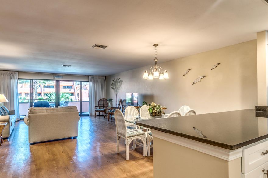 Stunning views will greet you from this recently updated 3BR/3.5BA condo on Holiday Isle in Destin, FL. The completely updated kitchen with beautiful new granite countertops, new cabinetry, & stainless appliances should be enough to put this condo at the top of your list. The first floor is home to the newly renovated kitchen, -1/2 bath and very large open living/dining area that leads you out to just one of the spacious balconies with great views. The second floor features a large master bedroom with private bath and balcony overlooking the pool and even a view of the Gulf. Additional bedroom with private bath is also on the second floor. The 3rd floor features a large open bedroom with its own private bath and a wall of windows to showcase the beautiful views.