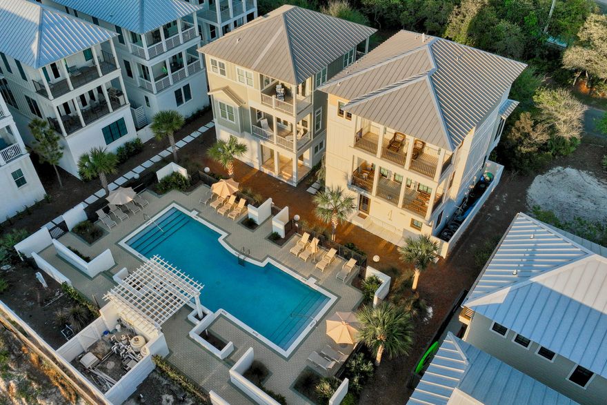 Escape to paradise with this incredible beach getaway that offers breathtaking, forever views of the Gulf. Meticulously maintained this 4-bedroom, 3 bath home is in pristine condition and has been used as a primary residence. Once you step inside you are greeted by the beauty of this recently renovated home. Fresh interior paint and new flooring create a clean and modern feel, while the all-new lighting and furniture throughout add a touch of luxury. The attention to detail is evident in every corner of this house. The reverse floor plan offers a unique layout, with a lounge area and three guest bedrooms on the first floor. Upstairs, on the second floor, you'll find the main living space, kitchen, and dining area. The kitchen is a chef's dream, featuring stainless steel appliances ..... solid surface countertops, a kitchen island with a bar sink, and ample cabinet space for storage. The dining room offers a built-in window seat overlooking the pool and Gulf, creating the perfect spot for enjoying meals with a view. The spacious living room is a cozy retreat, complete with built-in bookcases, a gas fireplace, and porches with spectacular views to the east and west. Relax and soak in the beauty of the surroundings from the comfort of your own home. The entire third level is dedicated to the primary suite, providing ultimate privacy and luxury. The suite features a sitting area with a coffee station/bar, dual balconies with stunning Gulf views, and a large en-suite bathroom. The bathroom boasts a double vanity, soaking tub, separate shower, and a spacious walk-in closet. Located in the desirable Park Place at Inlet Beach community, this home offers a huge community pool shared with just 10 homes in the neighborhood. Enjoy the convenience of a short walk or bike ride to the best shopping and dining options along 30A and 30Avenue. And when you're ready to hit the beach, the access is just across the street, allowing you to easily enjoy the sand, sun, and Gulf. Don't miss out on the opportunity to own this exquisite home that offers the perfect blend of luxury, comfort, and stunning views. Call now to schedule your appointment and experience the beauty of this beach house getaway firsthand.

