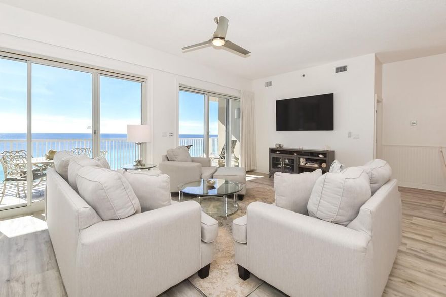 Discover a rare opportunity to own a piece of paradise in Miramar Beach's Empress, an exclusive, gated community renowned for its privacy and breathtaking vistas. This 9th-floor corner residence offers an unparalleled coastal lifestyle with 180-degree, unobstructed views of the Gulf of Mexico, Lake Stewart, and the Choctawhatchee Bay from every single room.Step inside and experience a thoughtfully designed open floorplan, accentuated by 10-foot ceilings and updated Luxury Vinyl Plank flooring throughout. The residence features two distinct living areas, providing ample space for relaxation and entertaining. The primary living room is a serene retreat with a cozy fireplace, a well-appointed wet bar complete with a standalone ice maker, and direct access to the expansive balcony overlooking the emerald waters. The second living area offers a tranquil alternative, presenting serene views of Lake Stewart and the community pool.

The heart of this home is the magnificent 50-foot wraparound terrace, seamlessly blending indoor and outdoor living. This incredible space is accessible from the main living area and both Gulf-side bedroom suites, perfect for savoring morning coffee or witnessing spectacular sunsets that stretch from Destin to Panama City. The master suite is a private sanctuary, featuring direct balcony access and large windows that frame the stunning Gulf views. The ensuite master bathroom is designed for ultimate relaxation with a Whirlpool tub, a separate walk-in shower, and a spacious double vanity. The first guest bedroom functions as a second master suite, offering private access to the beachfront balcony and its own ensuite bathroom. The third bedroom provides beautiful lake and pool views and is conveniently located next to the third full bathroom.

Life at The Empress is defined by an atmosphere of privacy and convenience. As a boutique condominium of only 44 residences, it maintains a serene, residential ambiance with a unique policy permitting only 14 units to be on a short-term rental program at any given time, making it a peaceful haven for full-time residents and second homeowners. The community is gated, with residents arriving via semi-private elevators that open to a foyer shared with just one other neighbor, ensuring a quiet welcome home. Exclusive amenities include a pristine pool and hot tub overlooking the serene lake, a private fitness room, and the assurance of a full-time maintenance and security staff dedicated to the community's well-being.

Beyond the daily luxuries, ownership at The Empress includes valuable perks designed for a seamless lifestyle. Each residence is assigned a large, climate-controlled storage space, and the building is equipped with modern infrastructure, including a HALO whole-building water system and fiber optics. Most importantly, you can invest with confidence, as The Empress has successfully completed its Structural Integrity Reserve Study and passed its Milestone Inspection, with no pending special assessments on the horizon.

The building's prime location on Scenic Gulf Drive places you directly across from 2,000 feet of deeded, sugar-white sand beaches, putting the Gulf of Mexico at your doorstep. While offering a tranquil retreat, you are also just moments away from the vibrant energy of Miramar Beach and Destin, with their renowned collection of world-class dining, boutique shopping, and coastal entertainment.

This is more than a condominium; it is a lifestyle defined by luxury, privacy, and the endless beauty of the Emerald Coast. There is simply no substitute for seeing it in person. 
