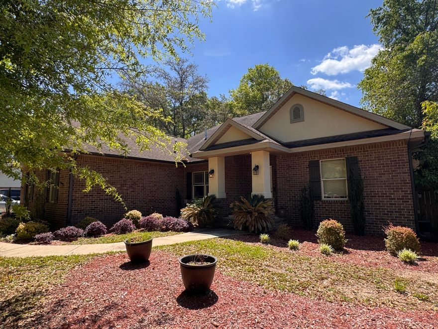 This beautifully maintained 3 bedroom (plus office/flex room), 2 bath custom built home offers comfort, style, & all the amenities you need to enjoy everyday living. Nestled on a corner lot, in the southernmost part of Crestview, this home makes for a quicker commute to bases, beaches, etc. and features a large, split, open floor plan with quality luxury vinyl plank flooring throughout - NO carpet! There is a large living room that is open to a lovely kitchen, complete with a pantry, granite counter tops, plenty of cabinet space, an island, breakfast bar, subway tile backsplash, stainless appliances (including a gas range), and there is a formal dining area.  The spacious primary suite includes tray ceilings and the ensuite boasts a luxurious soaker tub with tile surround, a walk-in tile shower, and double vanities with granite countertops, perfect for relaxing after a long day. There is also a separate toilet room and 2 walk-in closets. One guest room has tray ceilings, a walk-in closet, and jack-and-jill guest bath access, and the guest bathroom boasts granite counter tops, custom wood cabinetry, and a fully-tiled, zero entry walk-in shower. Two additional guest rooms are nicely sized. Light switches throughout the home are "smart" and can be controlled by Alexa. 
Step outside through French doors and unwind in the fully fenced backyard, featuring a large covered porch, attached deck, and a charming gazebo.

Additional features include:
Whole-house generator for peace of mind
Gutters with screens
RV or boat-ready exterior setup with full hook-up
Finished garage
Privacy fence
Shed

This home is move-in ready and full of thoughtful touches throughout. Don't miss your chance to call it home - schedule your showing today!

No smoking, including vapes. Pets may be considered on a case-by-case basis with prior owner approval and a non-refundable pet fee.