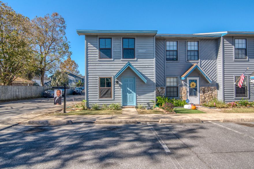 Enjoy this move-in ready townhome, completely updated! Upgrades include fresh paint and tile floors throughout, chair rail in the dining area, granite countertops and new stainless steel appliances in the kitchen, new vanities in both bathrooms, new fixtures, and new ceiling fans throughout. An ideal floorplan, the living area, kitchen, dining and half-bath are all located downstairs, with both bedrooms and a full bath upstairs. A spacious laundry room with shelving is also downstairs. Off of the dining room, step outside to a covered patio and you're a short walk to the community pool!The main bedroom features a spacious walk-in closet and an external door that walks out to a second-story deck.