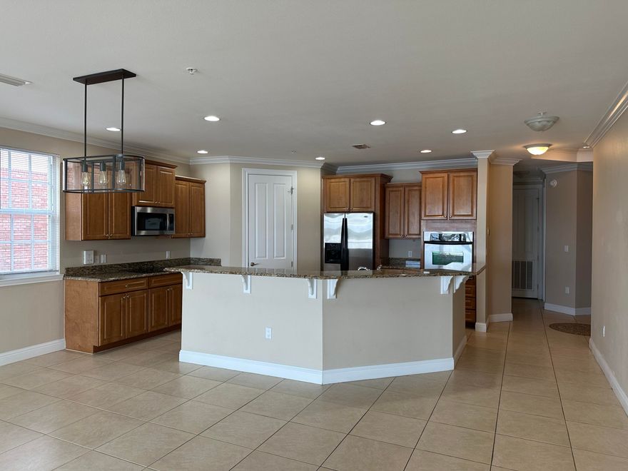 This is a great 2nd floor unit in a 4 story building with boat slip #3 included and excellent views of the Choctawhatchee Bay and the Intercoastal waterway. See the white sandy dunes all the way to the Destin Bridge, watch the fireworks on Wednesday evenings from your balcony between May and September. The gourmet kitchen is only one of the many upgrades. 9 foot ceilings, crown molding, a decorative mosaic Compass tile inlay in the entry, and a balcony off each bedroom. There is a whirlpool garden tub and separate shower in the master suite. There is a private enclosed 2 car private garage & an 11'x11' separate storage unit on the ground floor. The elevator makes for an easy '' lock and leave'' and ''one level'' lifestyle. New hot water heater and Garbage disposal in 2025.