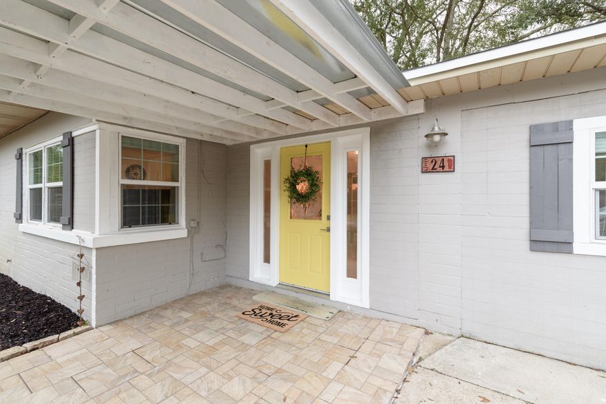 Elliott Point neighborhood. Ride your golf cart to the grocery store! The open kitchen is phenomenal with custom subway tile backsplash, lots of counter space, shaker cabinets, and stainless appliances. Room for everyone with two living areas and two master bedrooms. Homes with 3 bathrooms and an indoor laundry room are rare in this neighborhood, but this home has both! Situated on a large corner lot with a brand new deck just two blocks from the neighborhood boat ramp - bring your boat!