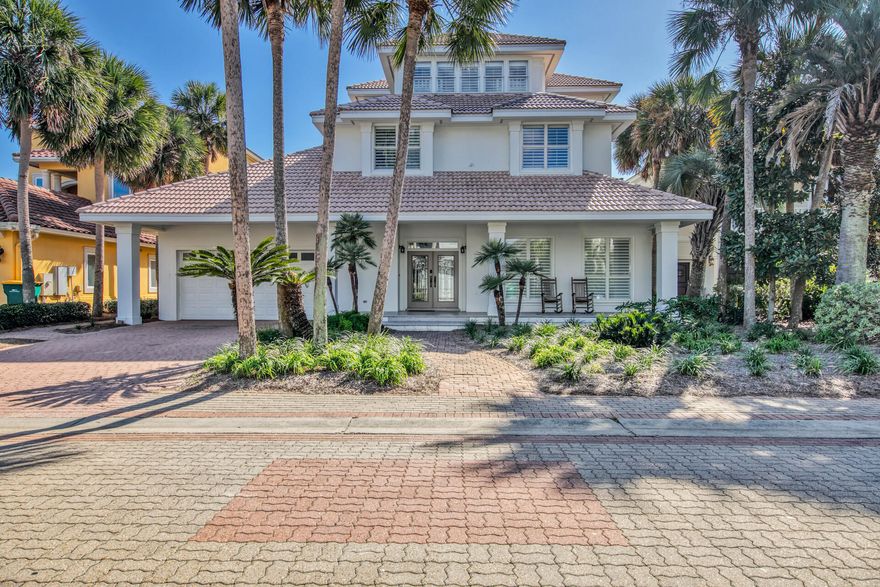 Here is your opportunity to own one of Destin's Premiere Beach homes. This home offers full unobstructed gulf views and direct access to the gulf only steps away from the pool and back yard. It is like owning a Gulf front home without the extra expense.  This custom home features hand carved oak cabinetry throughout. The gourmet kitchen features a Dacor stainless steel 6 burner gas stove and convection oven, microwave, warming drawer, a large designer SubZero refrigerator, wine cooler,& separate ice makers in kitchen & laundry room. The kitchen and double islands have gorgeous  granite countertops with double ogee edge. All rooms have plantation shutters & travertine stone tile. With almost $300,000 in projected rental income this home is an investors dream. This home is permitted to sleep