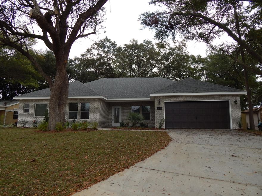 Be the first to live in this brand new home, located in Central Fort Walton Beach!! One-story, Craftsman Style Brick and Hardie Board! Energy efficient! Wood Cabinets, Granite Countertops, Ceramic tile throughout except for carpeted bedrooms! Beautiful 'knock-down' textured ceilings throughout home (no popcorn!) Large/Open Kitchen/Living area. This home has a Living Room AND a Family Room! Gorgeous Kitchen features an Open Breakfast Bar, granite counters, stainless steel appliances (built in microwave, smooth top stove, dishwasher & refrigerator), wood cabinets & a pantry! There is a Breakfast nook and a formal dining room as well! The Spacious master suite features a treyed ceiling. The Master Bath has a with a walk in closet, dual vanities, Garden Tub and Tiled Walk-In Shower! Three additional good sized bedrooms. Two wonderful Covered Porches!  One is just off the family room and the other opens from the Living Room!  2-Car garage with auto opener. Lawn pump and sprinkler system!  Call to see if there is time to pick your colors!  Home will likely be completed by Mid-November!