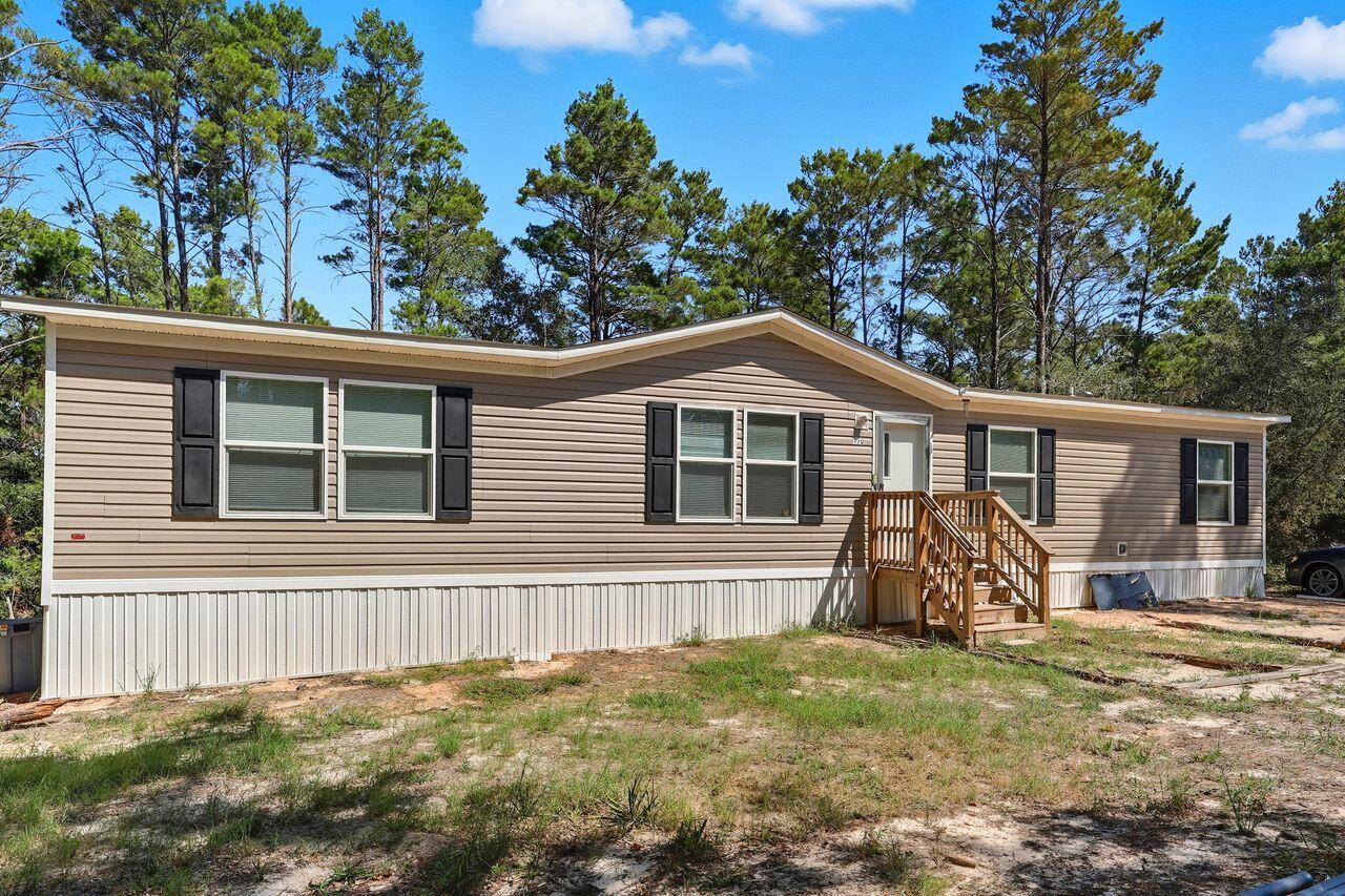 ✨ Just Listed in Mossy Head ✨Low County Taxes and NO HOA!!! Brand-new 2024 home featuring 3 bedrooms and 2 full baths in 1,512 sq. of living space. Lots of space in this split-bedroom plan. Light and bright interior with durable LVP flooring and cozy carpeting in select areas, complemented by neutral drywall finishes. The open floor plan flows seamlessly from the living area into a modern kitchen and huge dining space or additional living space. Highlights include: - Peaceful country setting; -Vinyl siding & composite shingle roof for lo;w-maintenance and durability; - Split floor plan with a spacious primary suite & private bath; -Ample natural light throughout with a warm, inviting feel; - conveniently located near I-10. Rare opportunity to own a brand-new property built in 2024. All the hard work has been done - it is ready for you to make it a home! Whether you're a first-time buyer or looking to get out of the hustle and bustle, thisbrand new affordable modern home at 170 Cowslip delivers!