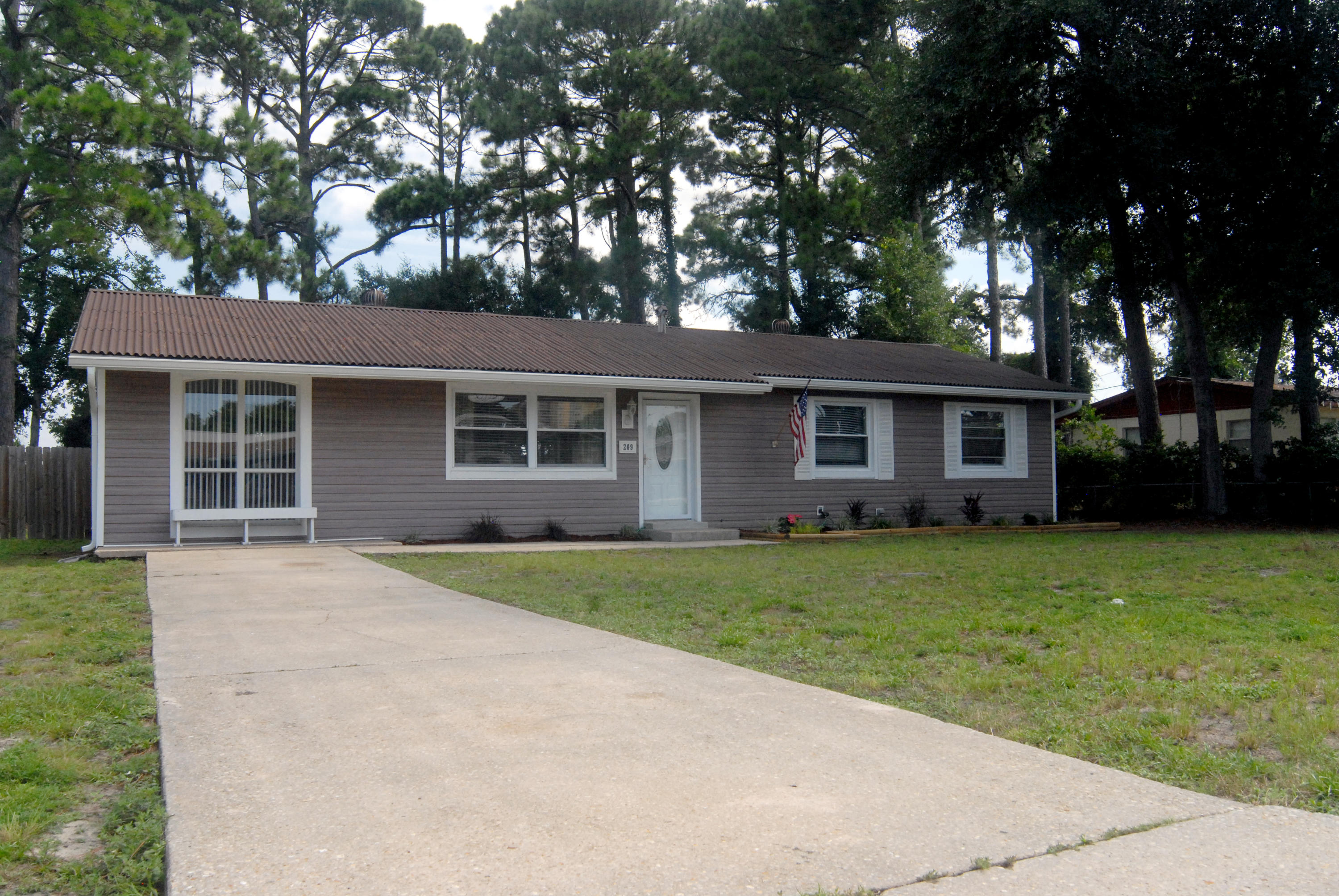 STOP THE CAR! This is the one you've been looking for! Cute, updated, spacious, large yard, and best of all affordable!! Located in the heart of FWB, this 3 bedroom, 1.5 bath home is ready for your family! It's close to shopping, white sandy beaches, Hurlburt Field and Eglin AFB plus it's turn key & move-in ready! NEW paint throughout, NEW carpet in the bedrooms and bonus room! As you enter the home, you step into a foyer area that opens into the front family room and open dining room. The dining space features additional pantry space and includes the sliding door (with removal pet door) out the backyard. The Kitchen has NEW tile flooring and features stainless steel appliances and sink. All appliances convey with the home.