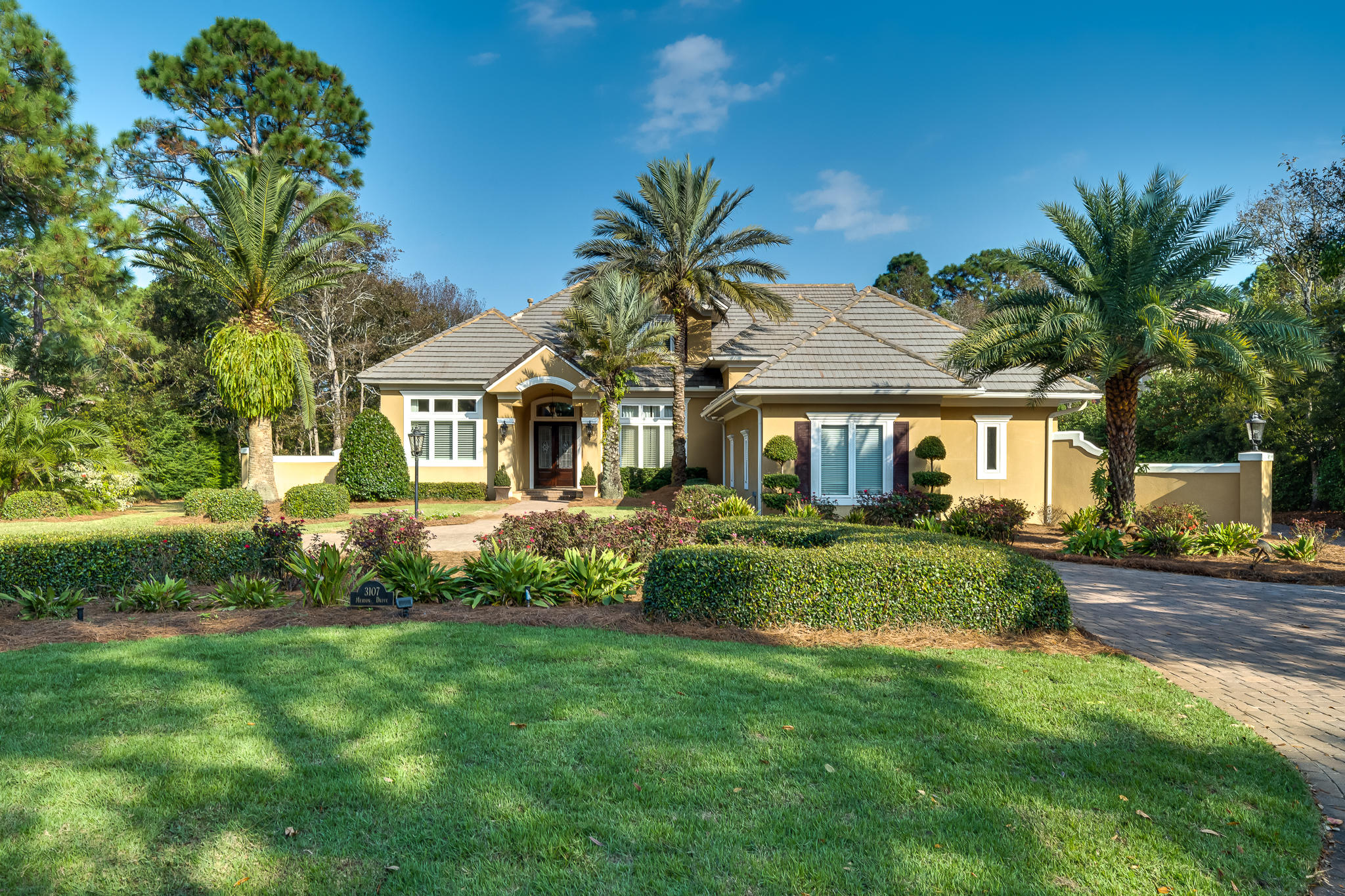 Premier residence on Merion Drive inside the prestigious residential community of Burnt Pine, located within the Sandestin Golf and Beach Resort. Estate sized lot surrounded by a lake, lush landscaping, and private golf course, allows you the ultimate privacy. Your outdoor living is enhanced with gorgeous pool, large outdoor patio and summer kitchen for endless summer nights of fun and relaxation. Fabulous kitchen, with a large center island is the focal point and gathering place. Beautiful marble and custom cabinetry that extend to vaulted ceilings enhanced with crown molding. Viking and Sub Zero appliances, including wine refrigerator and built in bar. Luxurious Master suite with office study, as well as a guest suite, located on the Main floor. Two additional Guest rooms upstairs.