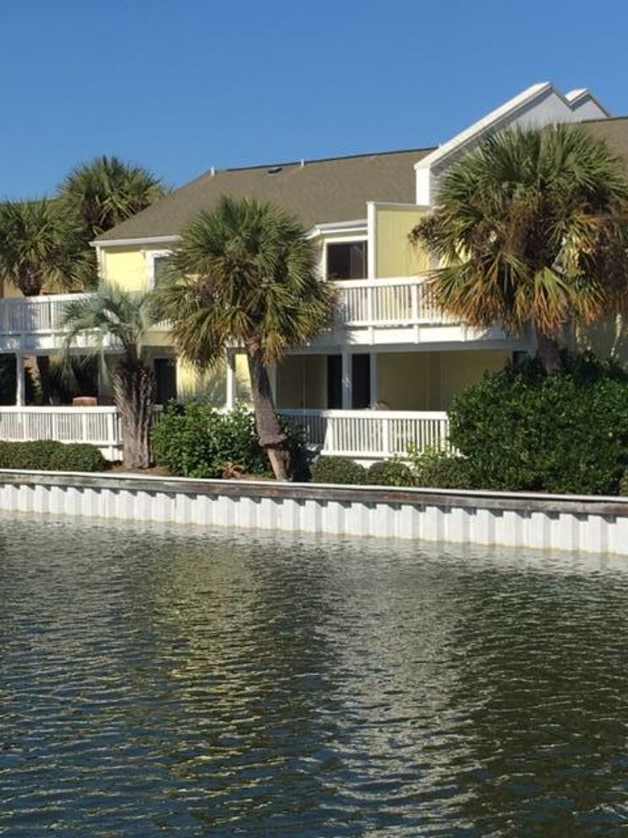 WON'T LAST! ! REDUCED FOR QUICK SALE!! VERY NICELY RENOVATED LAKEFRONT CONDO IN SOUTHBAY BY THE GULF WHICH IS CONVENIENTLY LOCATED TO EVERYTHING IN DESTIN. UNIT IS FURNISHED WITH FEW EXCEPTS. WILL DO $20,000+ANNUAL RENTALS. IT HAS TWO SOUTHERN FACING BALCONIES LOCATE ON THE LAKE SIDE. KITCHEN HAS BEEN UPGRADED WITH GRANITE COUNTERS WITH BACK SPLASH AND NEW LIGHTING. BATHS HAVE NEW VANITIES, FIXTURES, LIGHTING AND TUBS WITH TILE BACK. DOWNSTAIRS NEW TILE FLOORING THROUGHOUT AND UPSTAIRS INCLUDING STAIRWELL HAS UPSCALE ENGINEERED WOOD FLOORING. JUST A STROLL TO THE BEACH IN THIS LANDSCAPED 14 ACRE RESORT OF 109 TOWNHOMES. 300'' OF PRIVATE WHITE SAND BEACH. 2 POOLS WITH KIDDIE POOLS, LIGHTED TENNIS COURTS, SHUFFLE BOARD, CLUBROOM. PET FRIENDLY. CAN DO $21000-$26000 GROSS RENTALS.