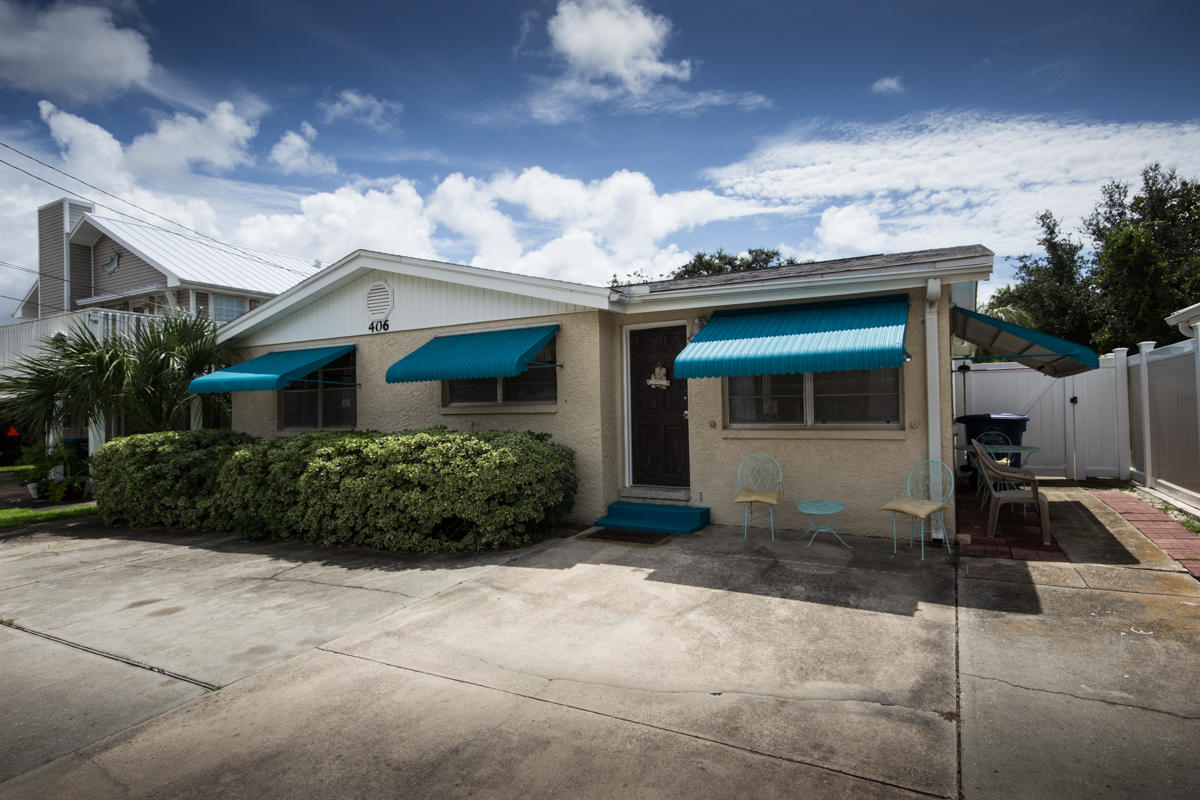 Lovely Old style Beach Cottage that had been re-worked inside along with new HVAC. Tiled, Solid Surface counters, New Kitchen and Bath cabinets. Sunroom could be used as extra sleeping quarters. Nice out side storage building all on a HUGE 50 x 150 Lot. Sprinkler system and plenty of parking out front. City Sewer and water and see the gulf from your Mail Box. Elevated Deck could provide a Nice Gulf View. Take the short walk to Bid a Wee Dedicated/ Private entrance Beach and relax on over 2000' of pristine Beach where No Condo's or Motels will ever distract you. This Home is Move in Ready ! (Short term rentals are NOT allowed in this R-1 district)No Mandatory HOA- No Flood Insurance required. Ask your Real Estate Agent for the Video Link !