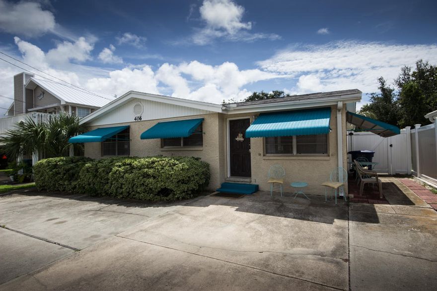 Lovely Old style Beach Cottage that had been re-worked inside along with new HVAC. Tiled, Solid Surface counters, New Kitchen and Bath cabinets. Sunroom could be used as extra sleeping quarters. Nice out side storage building all on a HUGE 50 x 150 Lot. Sprinkler system and plenty of parking out front. City Sewer and water and see the gulf from your Mail Box. Elevated Deck could provide a Nice Gulf View. Take the short walk to Bid a Wee Dedicated/ Private entrance Beach and relax on over 2000' of pristine Beach where No Condo's or Motels will ever distract you. This Home is Move in Ready ! (Short term rentals are NOT allowed in this R-1 district)No Mandatory HOA- No Flood Insurance required. Ask your Real Estate Agent for the Video Link !