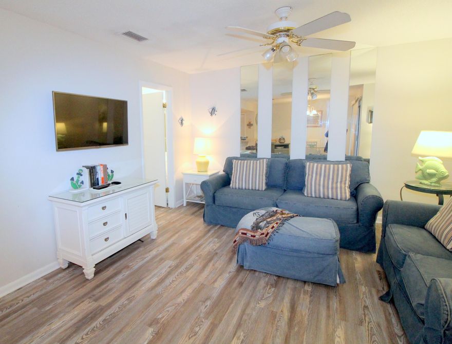 Great 'Canal' location in the heart of Destin. New Beachy LVP floors just installed. They are goregeous!  Unit is currently doing almost 20,000 per year. With updates projections are 31,000-33,000.  Park right in front of your unit. Sandpiper offers 1100 feet of private deeded beach access,  5 swimming pools with 3 hot tubs, 9 hole par 3 golf course, 6 tennis courts, pickle ball, shuffleboard, canal dockage,  onsite Boat launch, owners marina,  and a snack bar located on the beachfront. There is an assessment due every quarter for 141.97 until the 4th quarter of 2022. Buyer to varify all fees with HOA. Seller will not accept any out of state lenders. Must be local. Please see notes for how the Seller name should be ont he contract. Unit has been taken off rental for easy access.