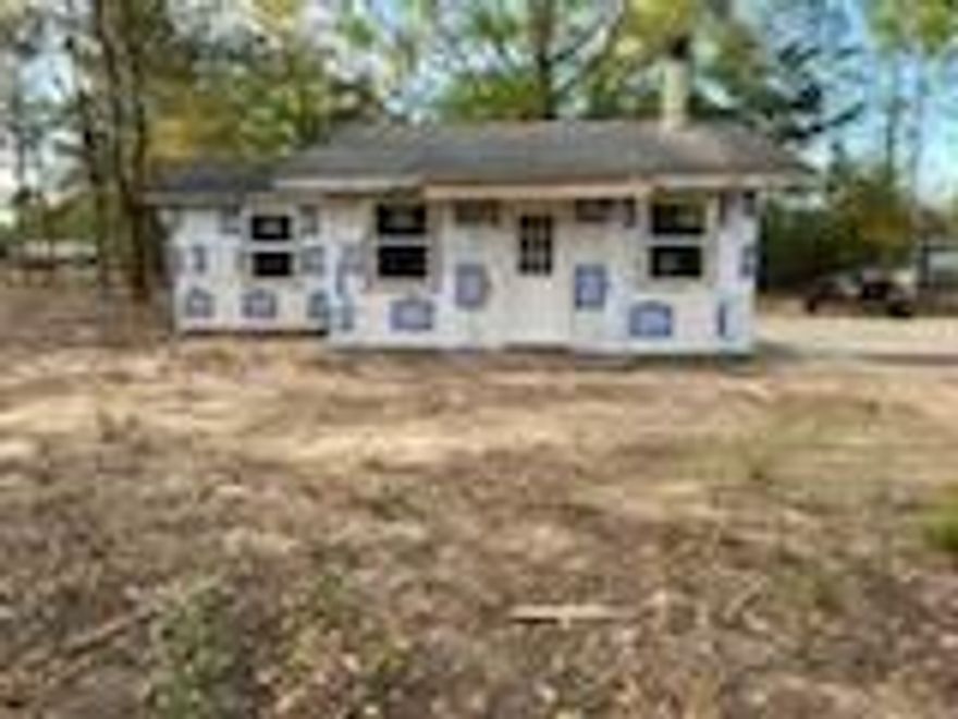 CASH CONTRACT ONLY! INVESTORS AND CONTRACTORS this 1 Bedroom 1 Bath home.  Mossy Head Water is available, tap fee not paid.  House has been new wiring and plumbing, Would be easy for a Buyer to add a 2nd bedroom, and finish siding and add a new roof.  Lot is 80x125'.