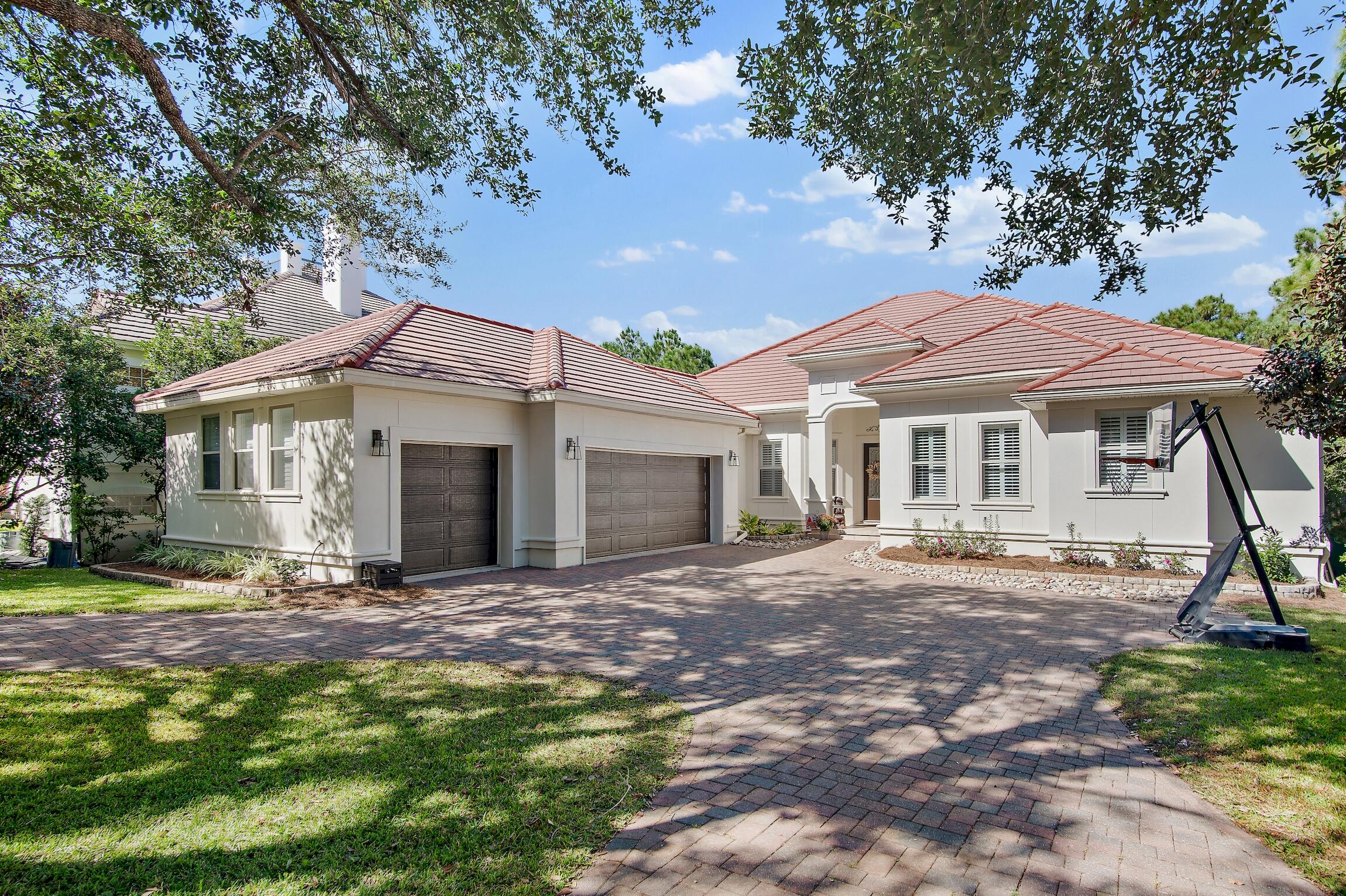 Under contract but  seller is taking back up offers.  Built in 2014 this one story home in Regatta Bay is situated on the first fairway of the award-winning Regatta Bay Golf Course. This home isprivate and secluded while being only minutes away from all the community amenities. Relax by the new, fully enclosed, heated pool built in 2020 with paver surround and an expansive sun deck. Full remodel was completed in 2022 to include a custom chef's kitchen, stacked stone fireplace in the great room, wide-plank premium LVP flooring throughout, modern bathrooms, and fenced in backyard. Full-sized 3-car garage is climate controlled and equipped with high-speed, Level 2 EV charging. Tile roof was recently inspected and built with upgraded wind-mitigation features, combined with hurricane glass.