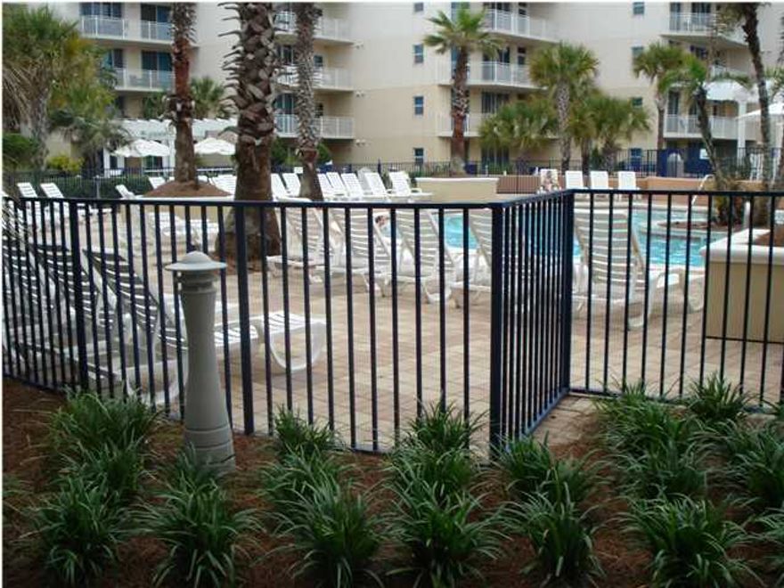 -This wonderful unit is perfect! Walk out your back door onto grass, thru gate to upper pool. It's like having the convenience of your own personal pool. Beautifully decorated and just waiting your guest/family vacation. Tile floors thru out and newly painted in bright cheerful colors. Enjoy the amenities of Waterscape: 3 pools, 2 hot tubs, fitness center, lobby with on site check in, covered parking, tiki bar, and all this within walking distance of Resturants, grocery and shopping. Great rental property or second home. Gross rental income 2014 $31,000 and 2015 YTD (08/24/2015) $33,500.