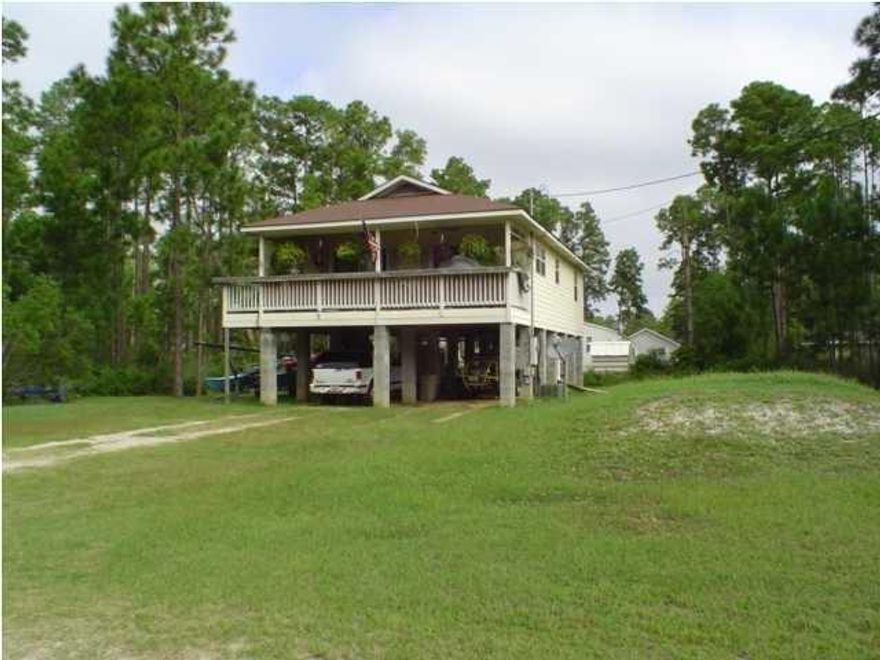 Great 2 bedroom home built on stilts, large yard plus covered parking. Open floor plan and living room. Galley kitchen with small family room plus inside laundry.