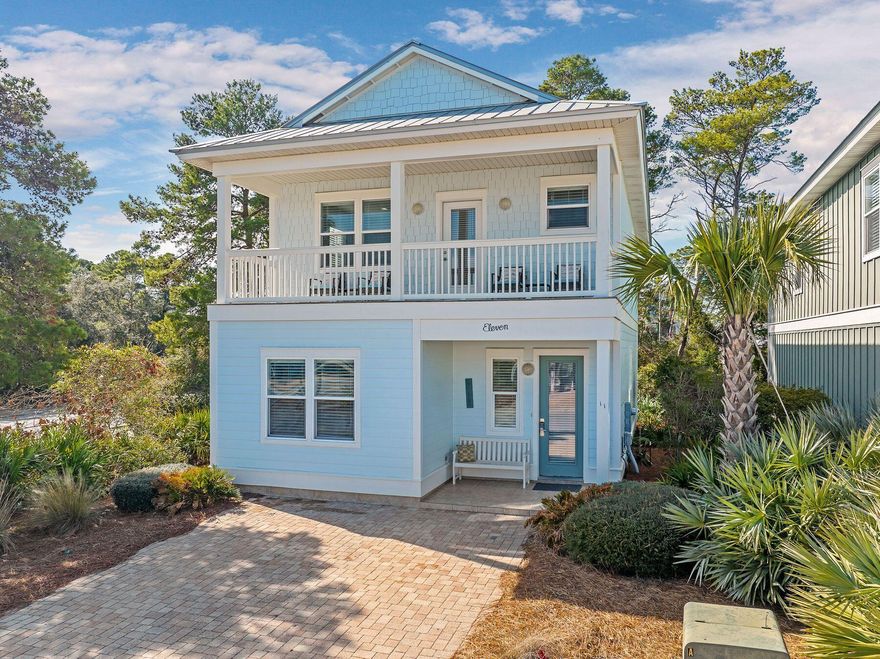 Perfectly positioned less than a 10-minute stroll from Ed Walline public beach access, this beautifully designed Florida cottage in Gulf Reflections offers the ideal setting for a full-time residence, second home or vacation rental. Located in a quiet enclave of just 15 homes, this property provides privacy and convenience with easy access to the vibrant energy of 30A. From the moment you arrive, the newly painted exterior and inviting front porch set the tone for the warm and welcoming interior. Inside, hardwood floors, granite countertops and solid interior doors highlight the home's quality craftsmanship. The open-concept living and dining area creates a spacious atmosphere, complemented by a generous galley-style kitchen featuring classic Shaker-style cabinets, stainless appliances, a sea glass tile backsplash and a long peninsula bar with pendant lighting and shiplap detailing. A glass door leads from the main floor to a private rear patio, surrounded by mature pines and native greenery for a serene outdoor escape. Designed for comfort and privacy, the home features two master suites  one conveniently located on the first floor with an ensuite bath, and another upstairs with a covered balcony stretching the width of the home. Two additional bedrooms, each with its own ensuite bath, provide ample guest accommodations. One room is currently configured as a bunk space, offering a cozy retreat for children with a twin-over-queen bunk and an additional pull-out. Offered fully furnished and designed for low-maintenance living, this home is just steps from the community pool and boardwalk leading to the beach. Gulf Place and a variety of local shops, restaurants and entertainment options are just a short stroll away, making it easy to embrace a laid-back coastal lifestyle.