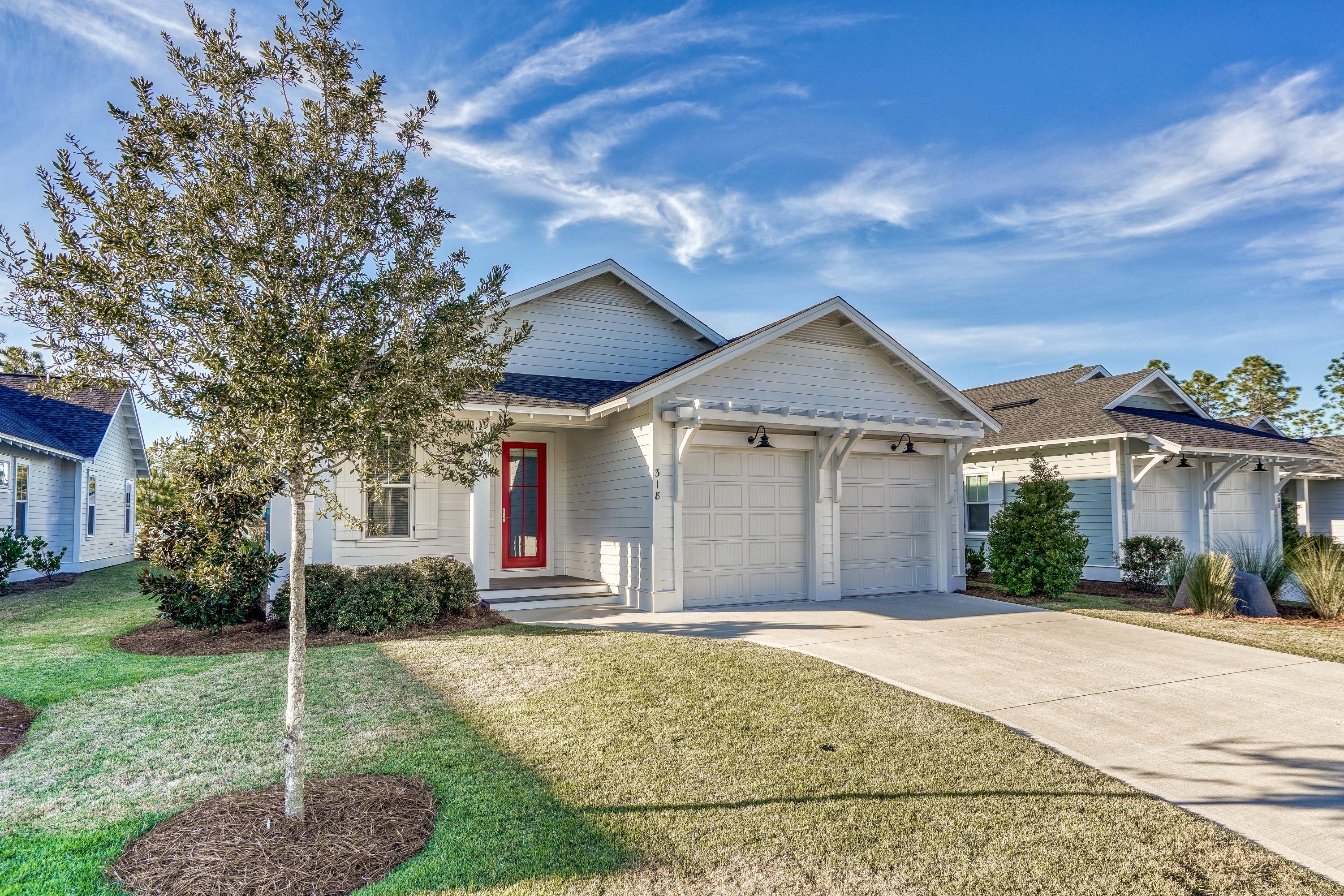 This home has three generously sized bedrooms each with their own walk-in closet and full bathroom. The kitchen has a walk-in pantry and center island and flows seamlessly into the spacious dining room. The large living room opens to the screened porch. The bonus room could be a smaller bedroom or an office.   One year lease required.