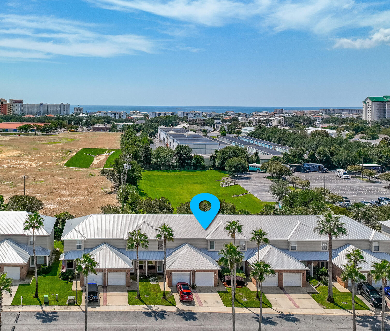 Here's your opportunity to live in paradise! Centrally located in the heart of Destin is this move-in ready townhome in Magnolia Park.  Nice floor plan with open living/dining/kitchen, large powder room with enclosed laundry area, two ensuite bedrooms both with walk-in closets.  Upgrades include stainless appliances, wainscoting, smooth ceilings on the first level. Lovely privacy fenced backyard with covered patio.  Low HOA fee include yard maintenance and irrigation, community pool.  Convenient location to restaurants, shopping, schools, attractions, Destin Harbor and much more!  All dimensions important to the buyer should be verified.