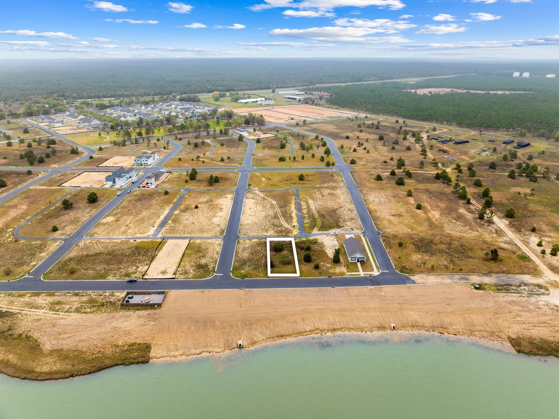 Discover your perfect homesite in the serene Owl's Head community. Located on Bluebeech Street, this lot offers beautiful views overlooking the picturesque community lake. Surrounded by single-family residences, you'll enjoy the peaceful atmosphere of this neighborhood. Take advantage of the central park at the heart of the community and explore nearby outdoor trails for recreation. With convenient access to shopping and dining, entertainment is always close at hand. Build your dream home and embrace the tranquil lifestyle that Owl's Head has to offer!