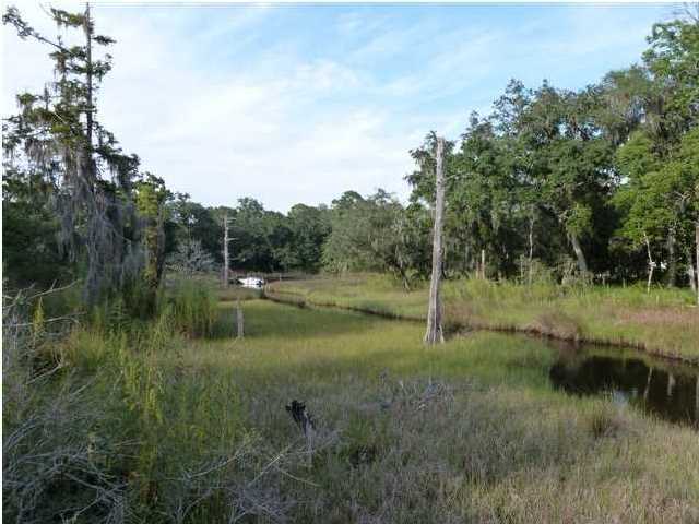 ***Canal Front Lot*** This lot is located in Sacred Oaks, a new neighborhood located on the beautiful protected deep waters of Mack Bayou. Sacred Oaks subdivision, on 16 acres of land, is nestled among 100 year old oak trees and offers an exclusive lifestyle in a quaint subdivision with heavily landscaped lots ensuring quiet tranquility for years to come.