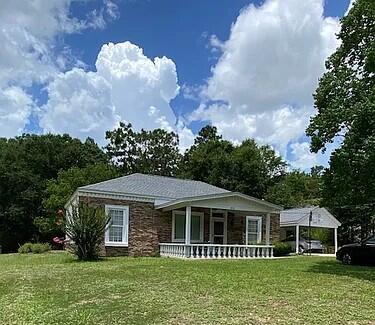 *Professional Pics Coming Soon!Amazing Opportunity! This home was originally built as a 3-bedroom 2 bath however an additional full kitchen, bath, bedroom, living room and separate entry way was added. The additional space can be sectioned off to provide additional rental income or a space for a mother/father-in-law suite! It's perfect and a must see! The home was well maintained and has a huge front/back yard and a huge gorgeous covered front porch. The rooms and closets are a generous size. There is plenty of storage space.It is centrally located, minutes from downtown Crestview, less than 3 miles from grocery stores, 15 miles from Duke field and 23 miles from Eglin AFB. Hurry before this gem is gone!